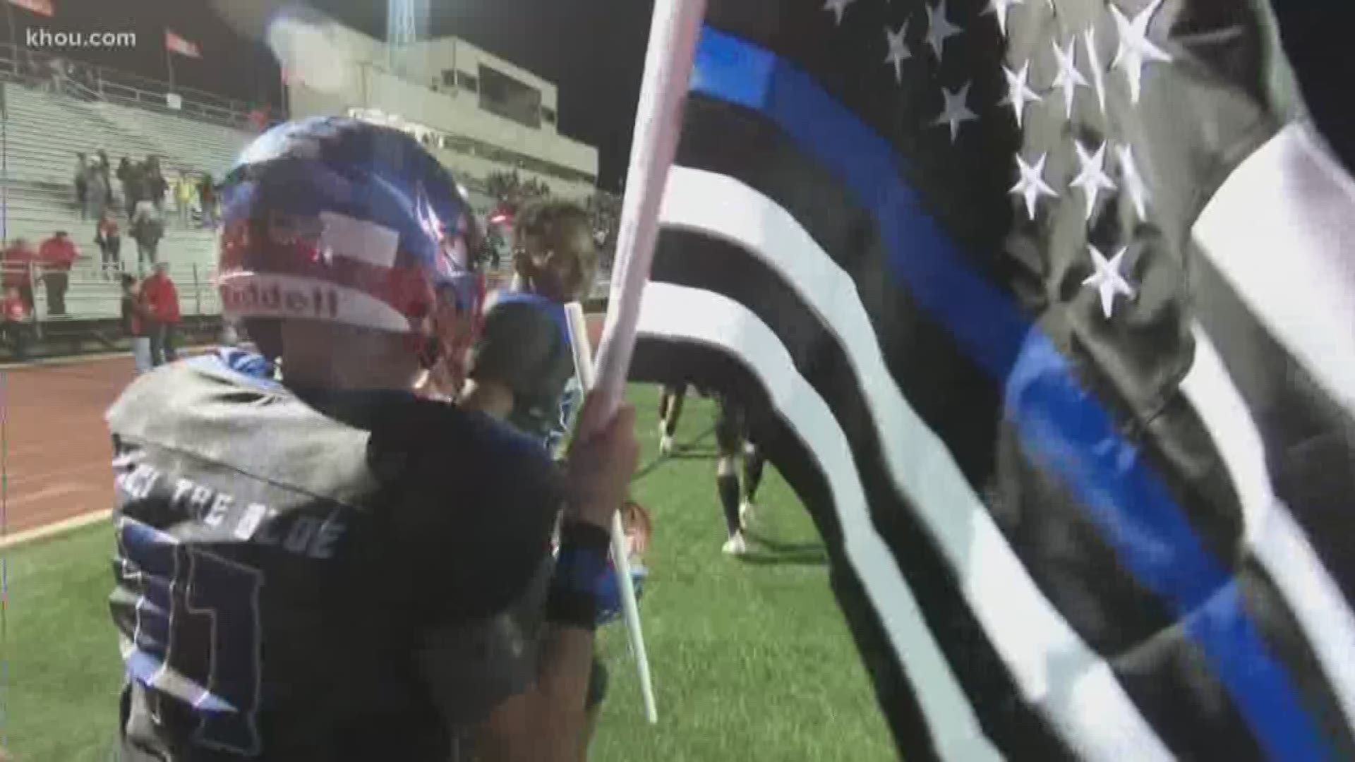 A high school football team decided to ditch the school colors on Senior Night to honor fallen police officers.