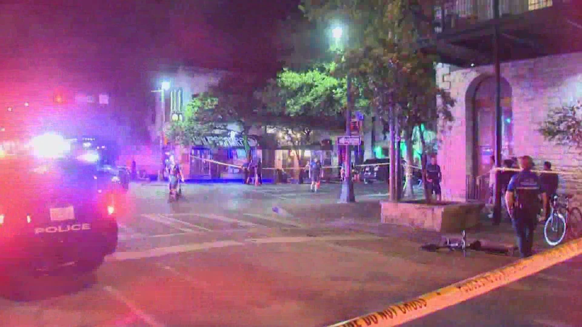 One person is in custody in connection with the mass shooting that injured 14 people in Downtown Austin.