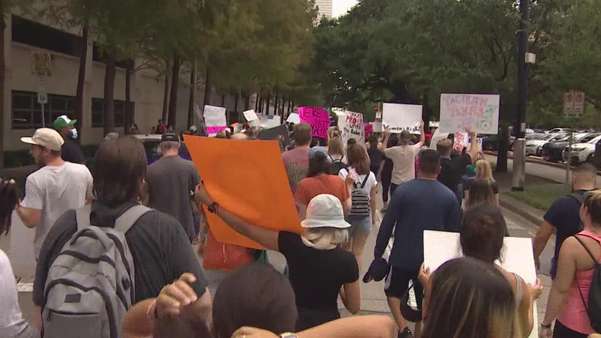 Chants could be heard throughout downtown Houston as hundreds of pro-choice marchers took to the streets Saturday morning to protest the new Texas abortion law.