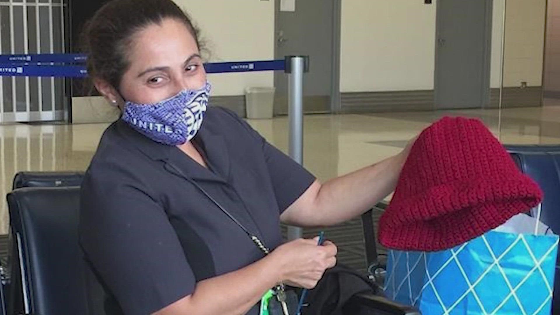 United Airlines employees at Bush Airport donated handmade scarves and hats, socks, gloves, blankets and hygiene kits to make about 400 care packages.