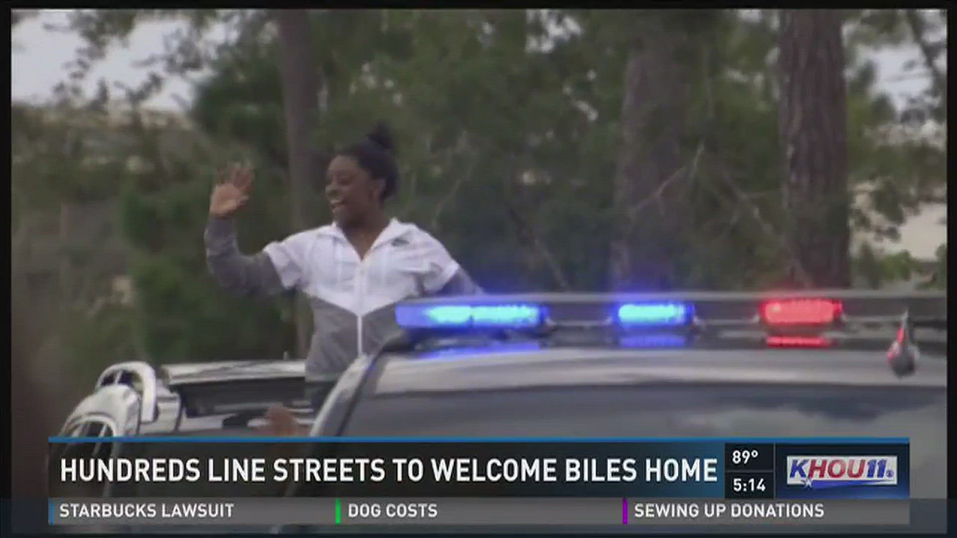 Olympic gold medalist Simone Biles returned home to cheers from residents lining the streets on Wednesday.