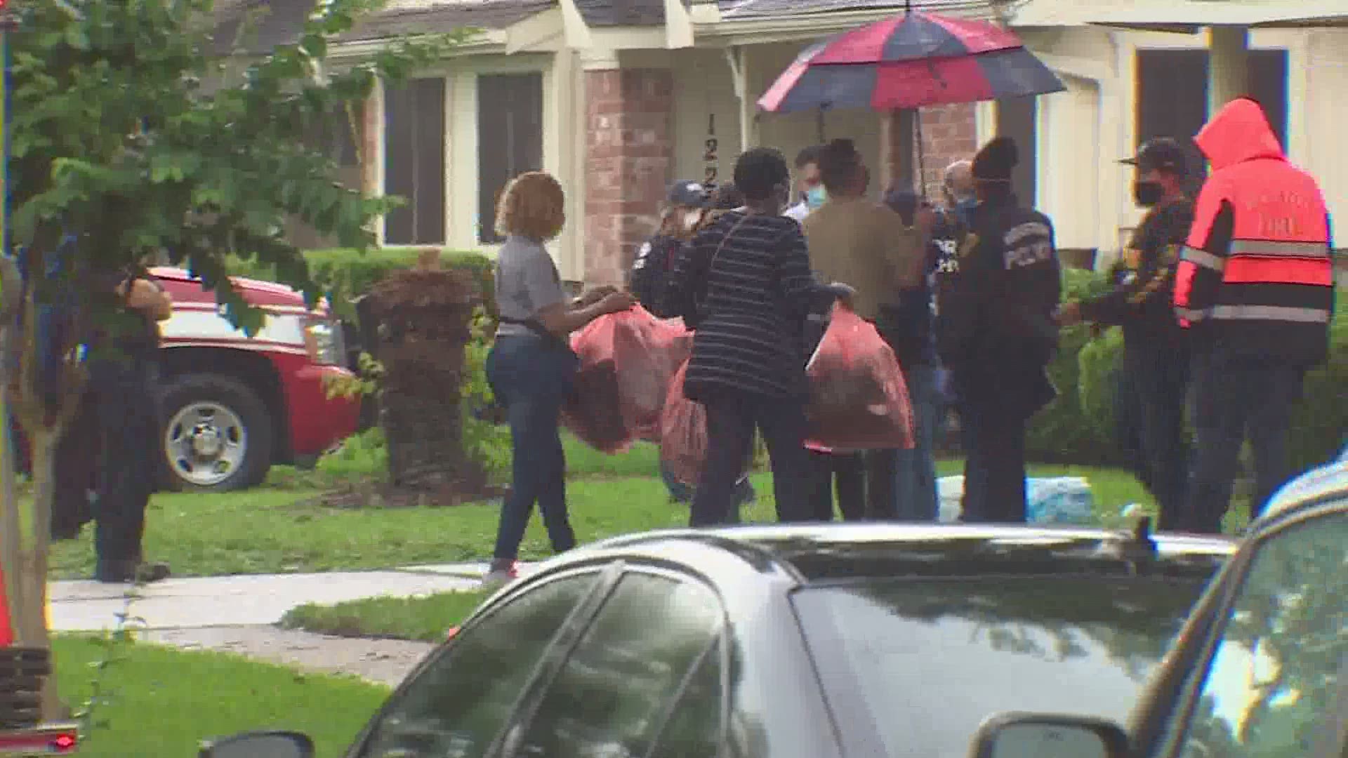 Houston police said dozens of people were found inside a home in Southwest Houston on Friday.