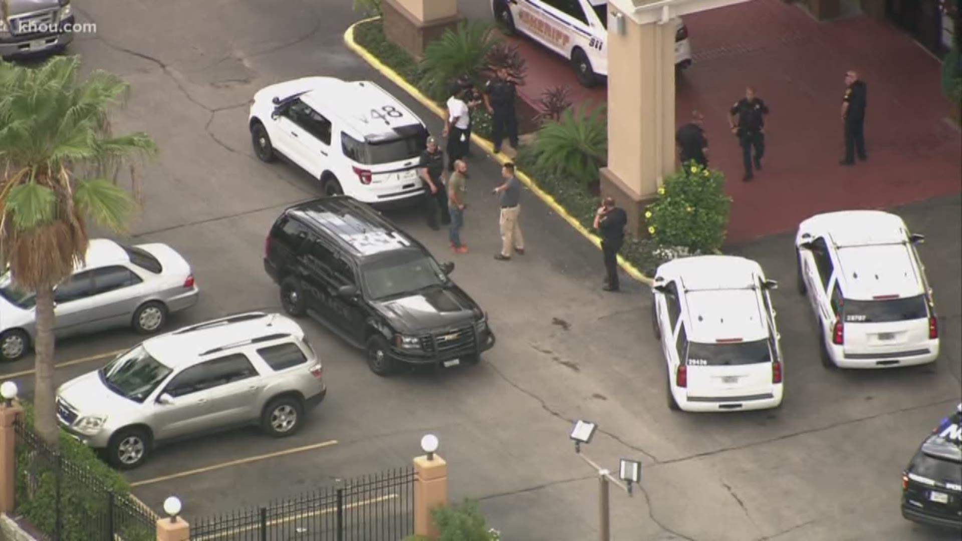 Police have surrounded businesses and a hotel in southwest Houston near the Southwest Freeway and Hillcroft.