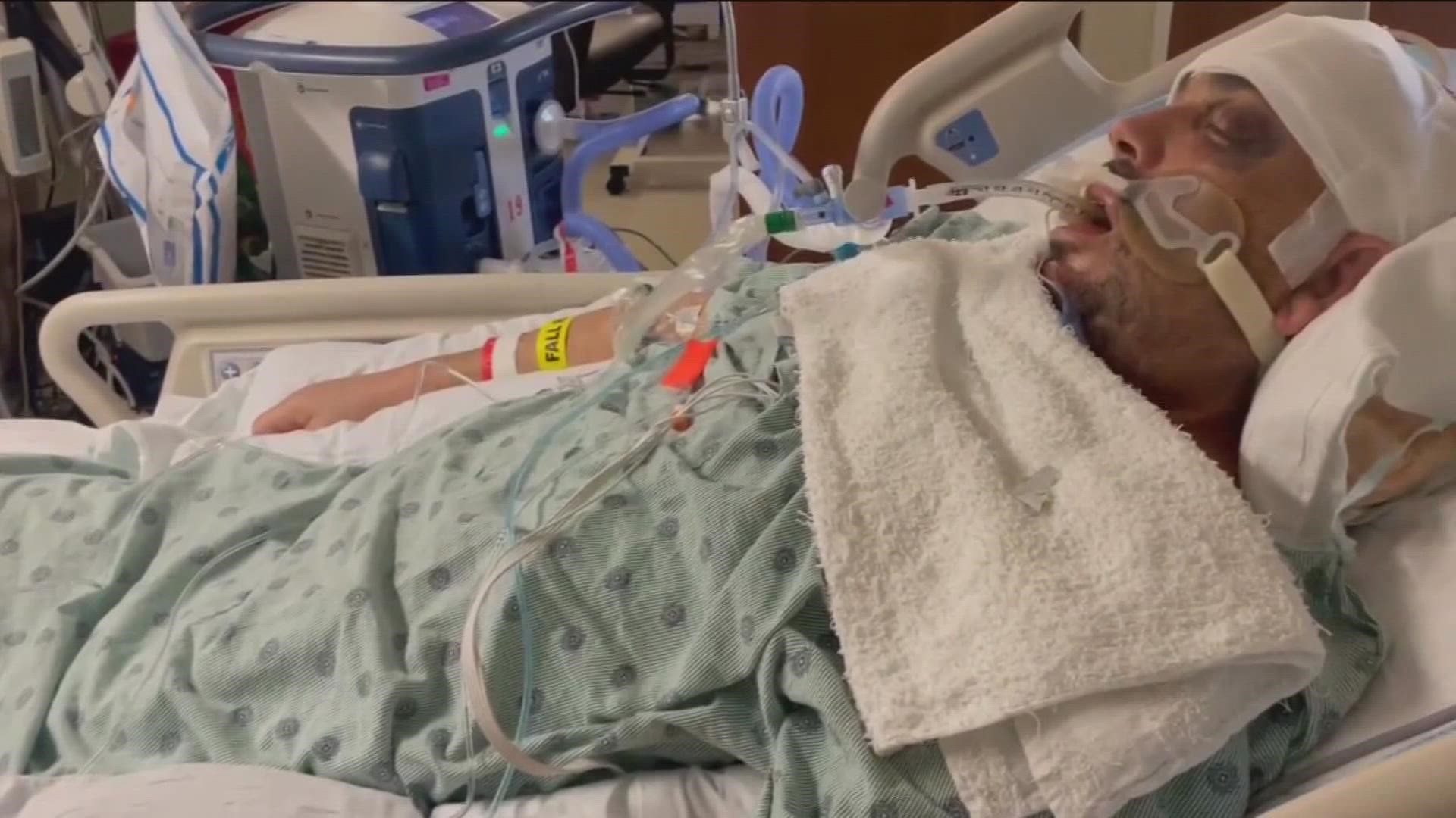 The man is reportedly in a coma after the jail said he fell out of a bunk bed, but his family says his injuries aren't consistent with falling.