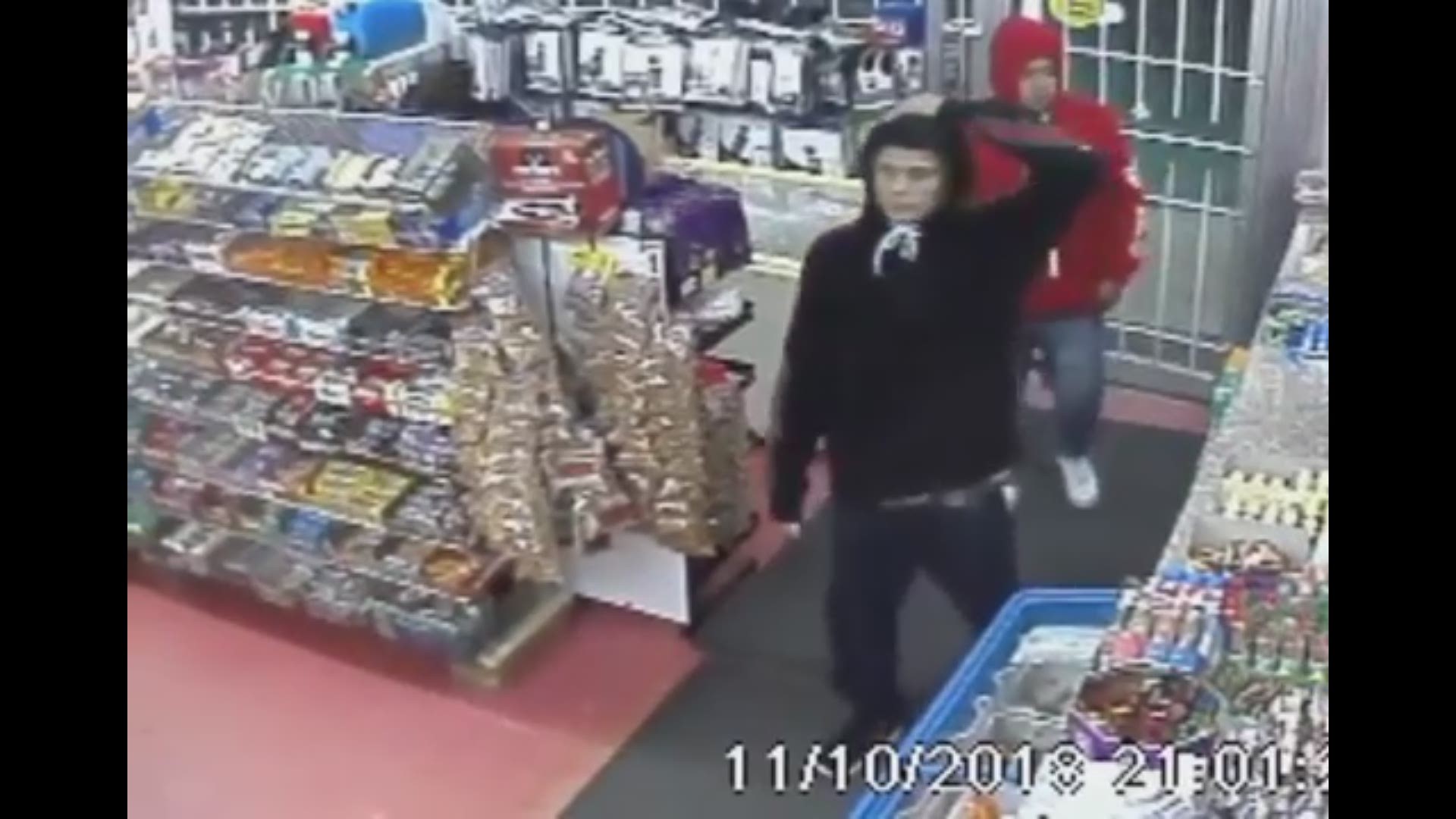 Police are looking for two suspects who shot and killed a convenience store employee in northwest Houston on Nov. 10.