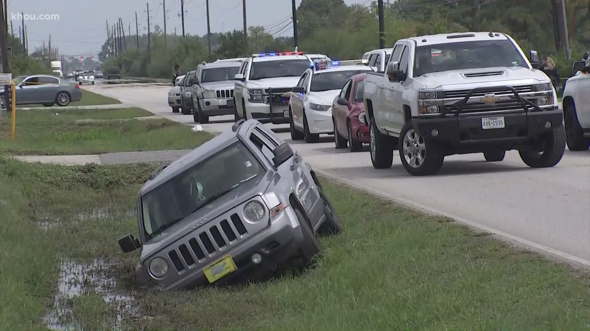 A woman is in custody after deputies say she was accused of opening fire on another woman during a possible road rage incident.