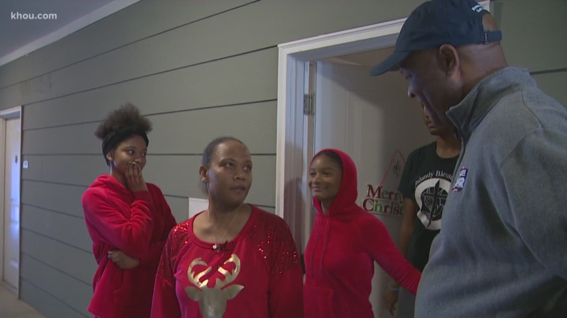 Demica Moore and her children now have furniture inside their apartment.