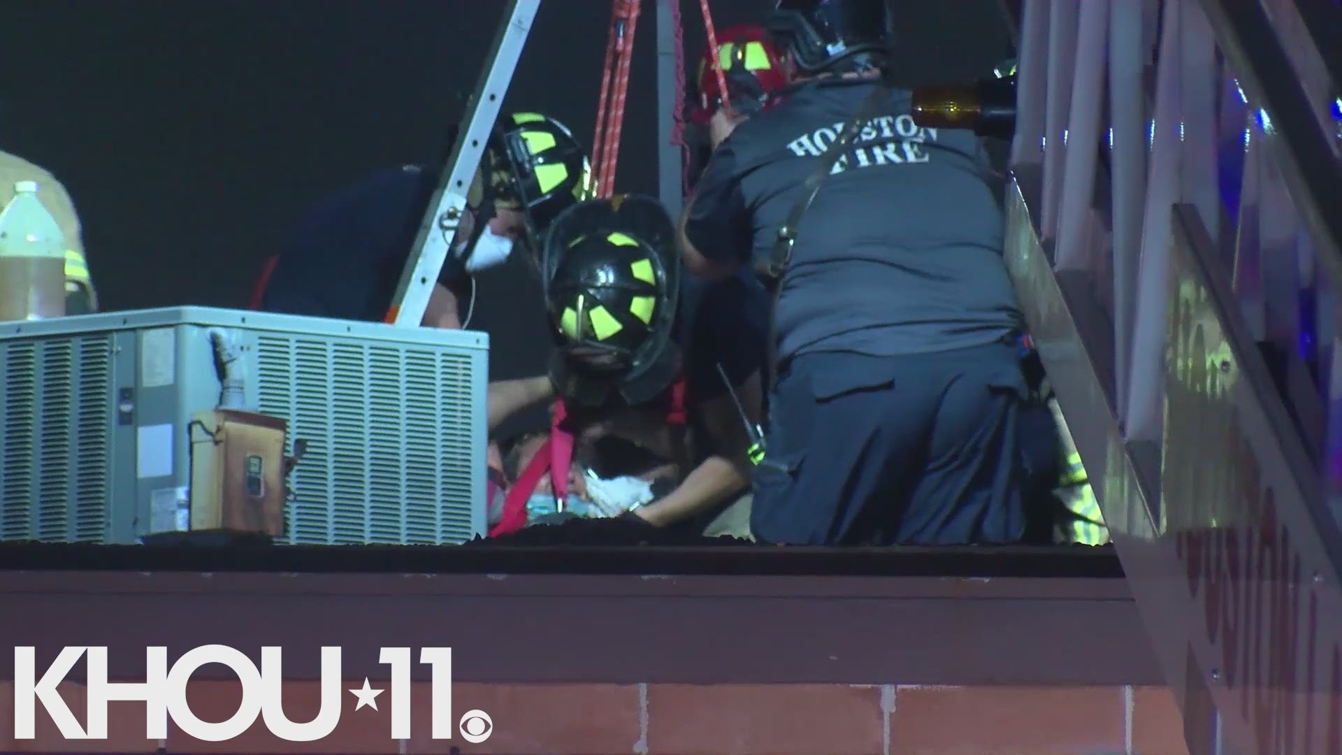 A suspected burglar was found stuck inside of a pipe on the roof of a business in the Gulfton-area. A man walking his dog found the man on the roof and called 911.