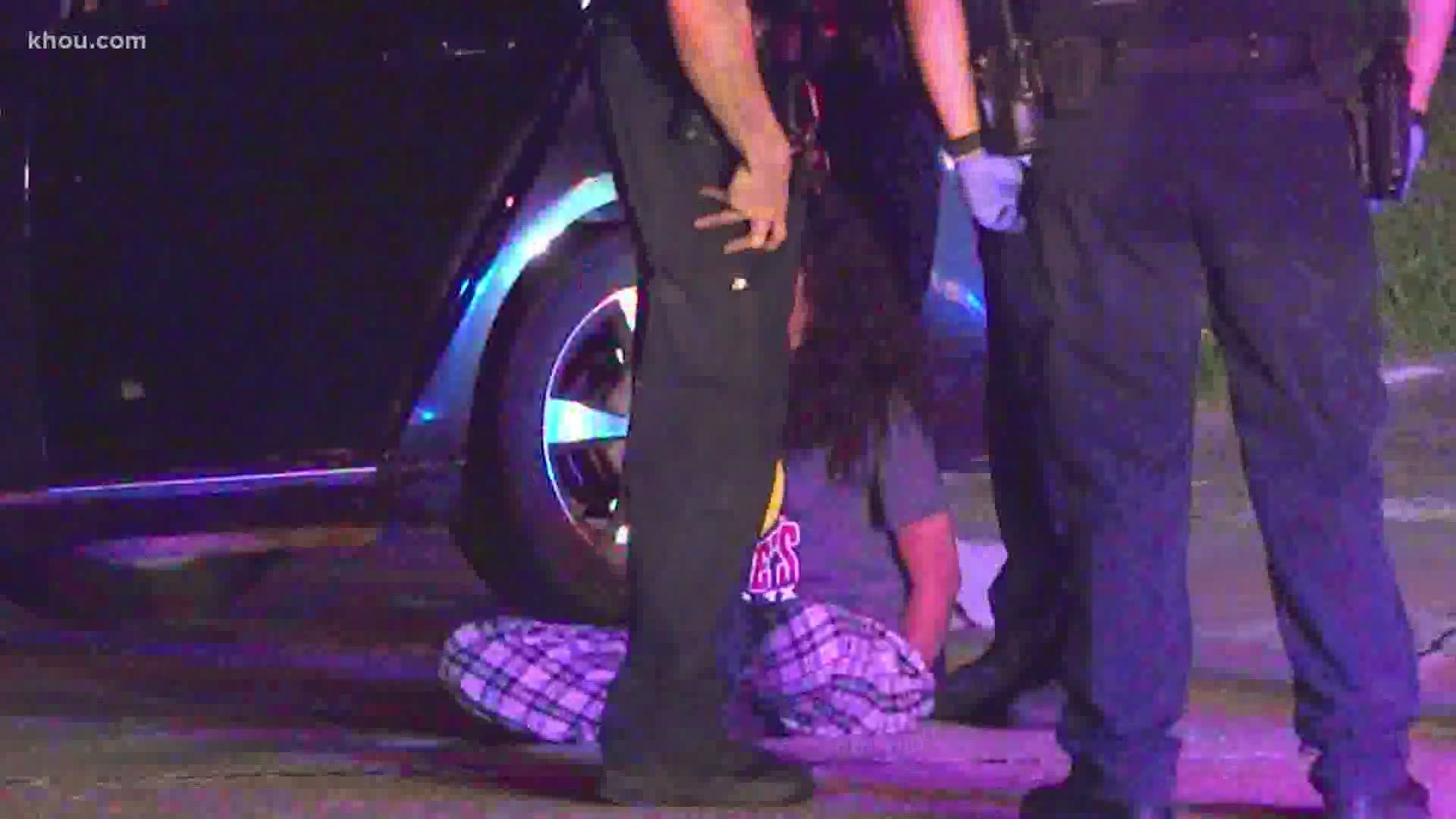 Four people were detained early Friday after a pursuit and a crash involving a police officer.