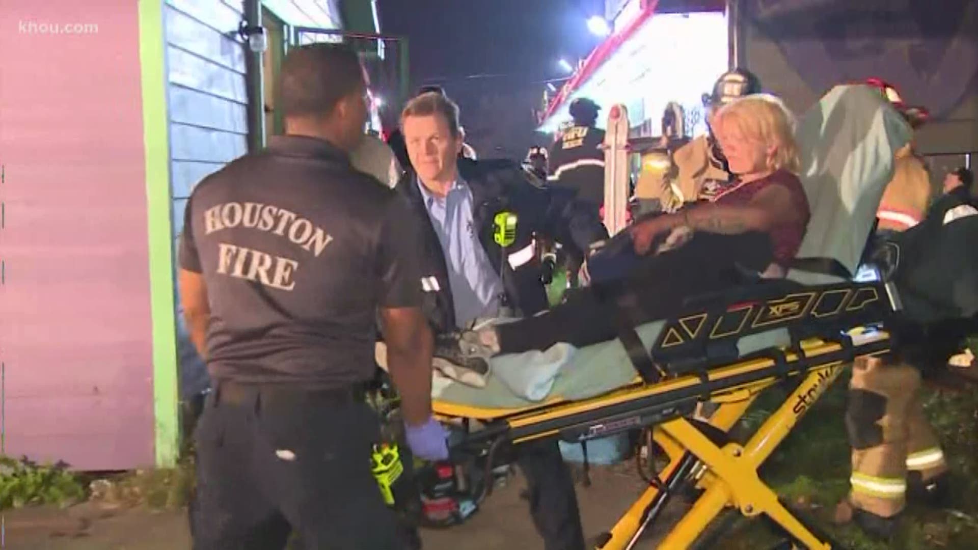 Firefighters rescued a woman after they say she got stuck in an air vent after breaking into a northeast Houston home early Friday.