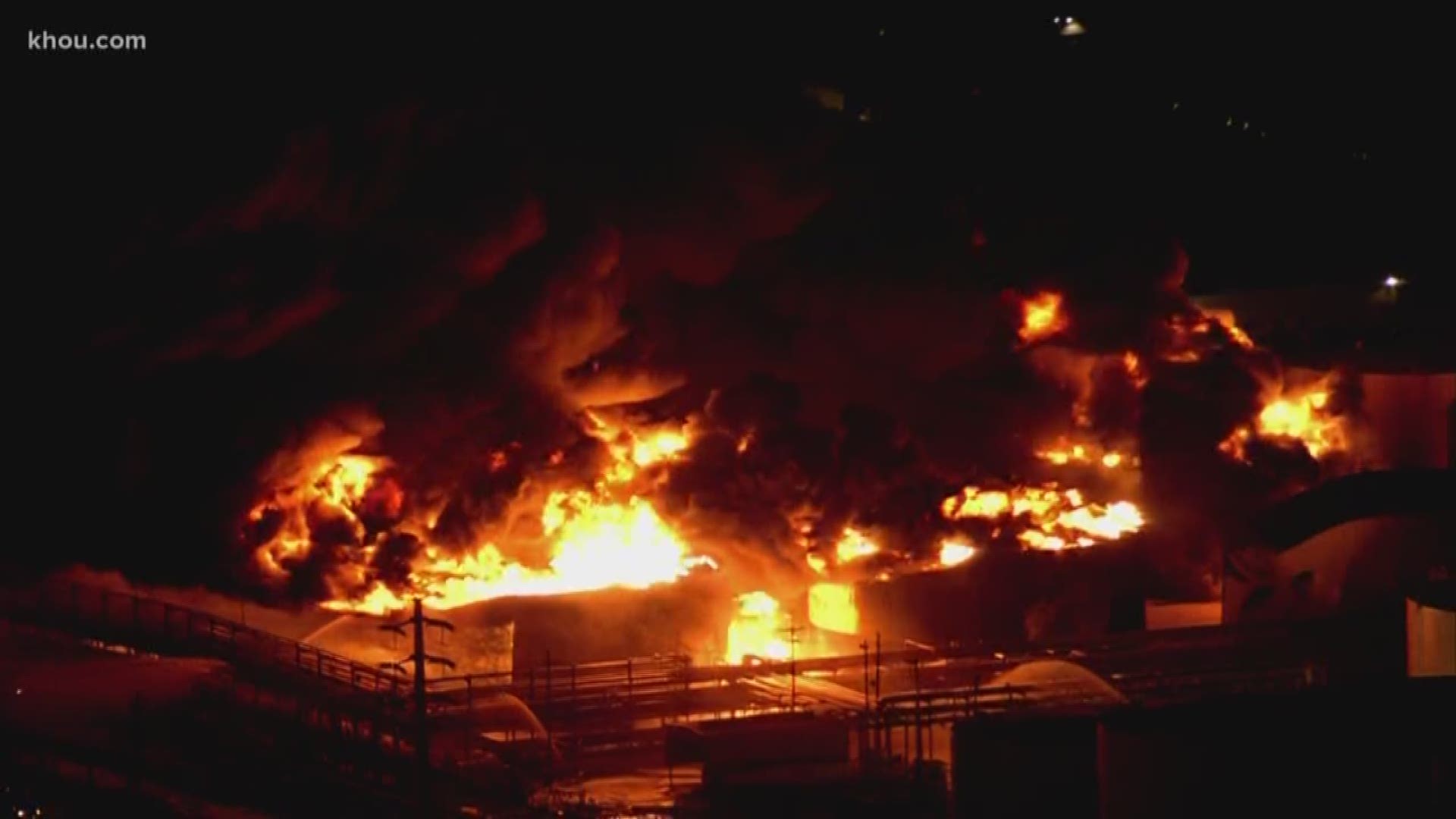 A large fire at Intercontinental Terminals Company in La Porte continued to burn Monday night, spreading to an additional six tanks earlier in the afternoon