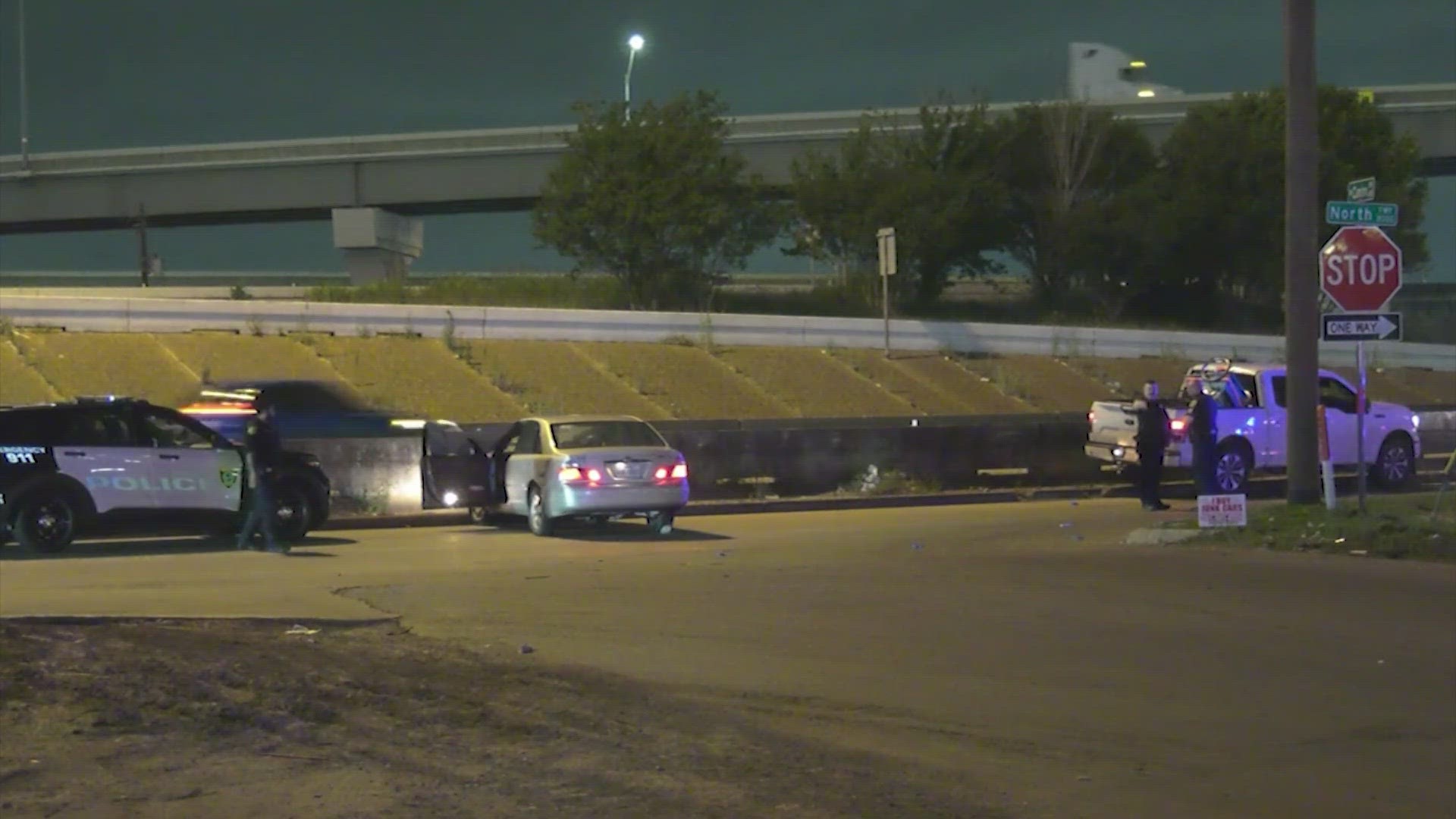 A gunman is on the run after a man was shot and killed in his car at a stop sign near the North Freeway, according to the Houston Police Department.
