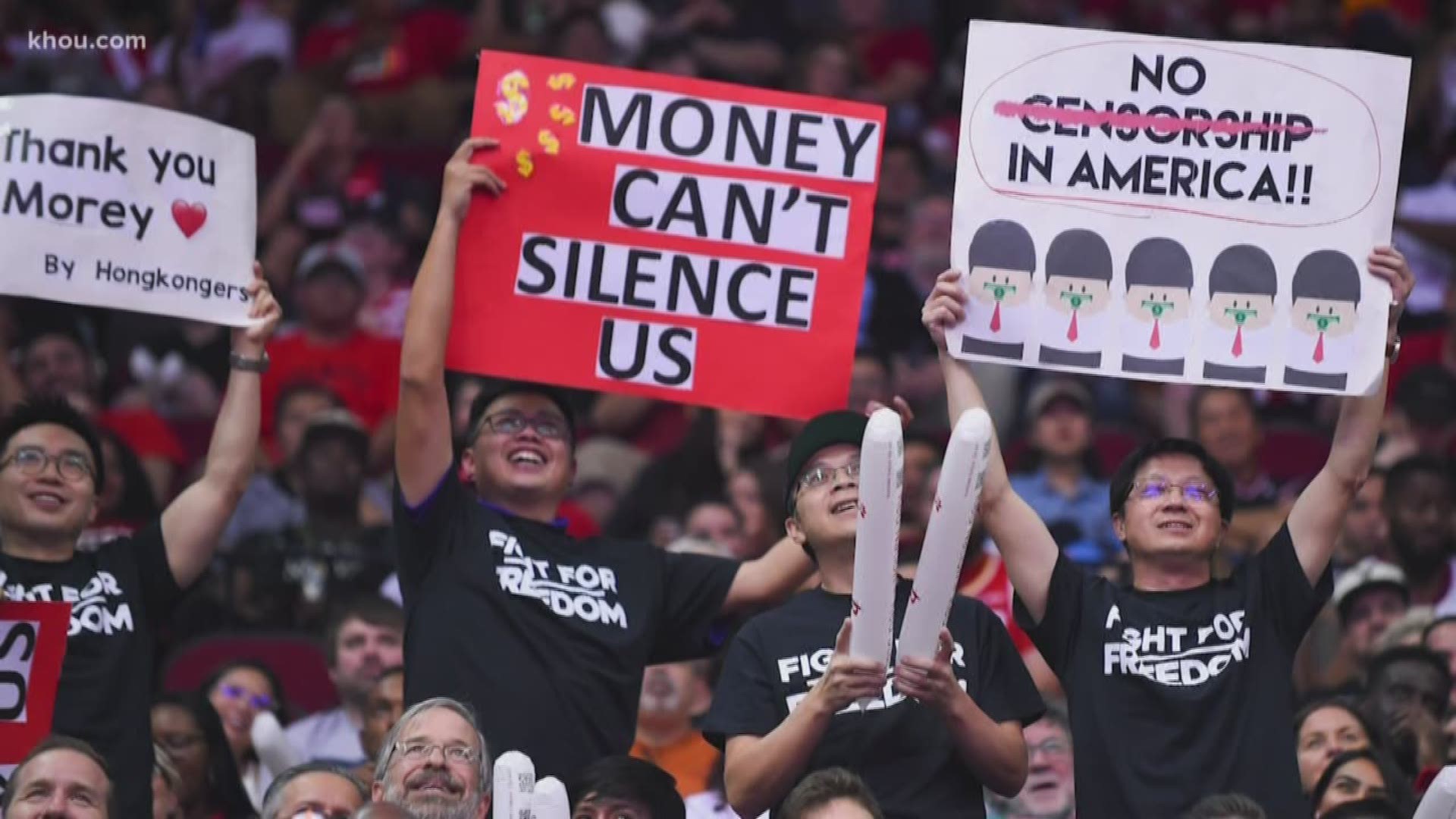 A group of 30 fans at the Houston Rockets' season opener against Milwaukee held signs and wore shirts in support of anti-government protesters in Hong Kong.