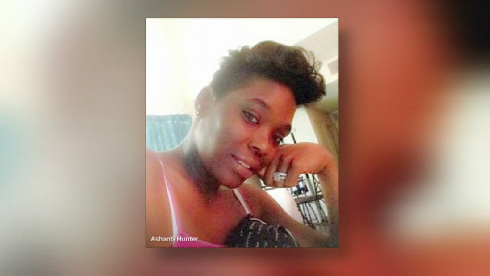 A woman was shot and killed in front of her three children as she tried to get away from the children's father who opened fire outside of their apartment Sunday afternoon.