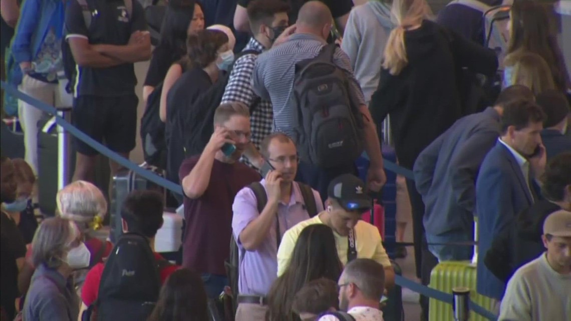 Travel woes continue after more than 750 flights canceled Sunday