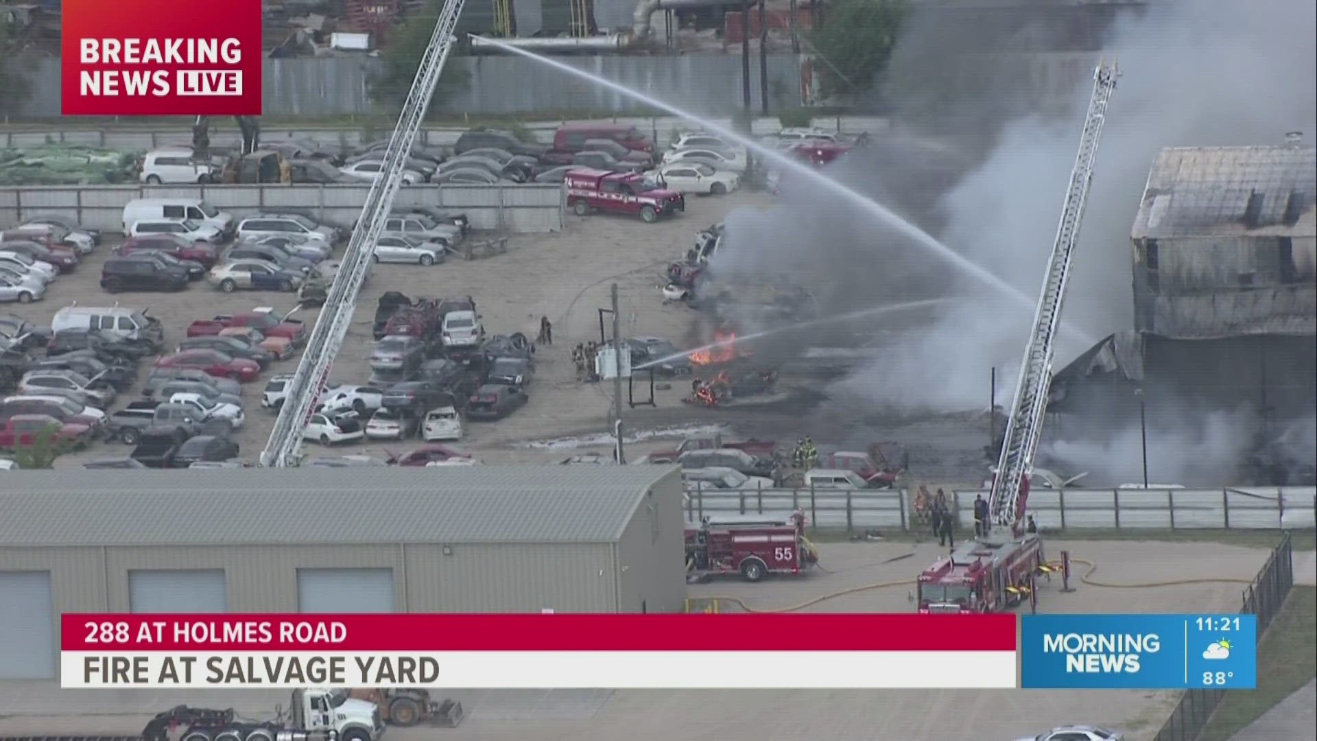Firefighters battle fire at salvage yard along Highway 288.