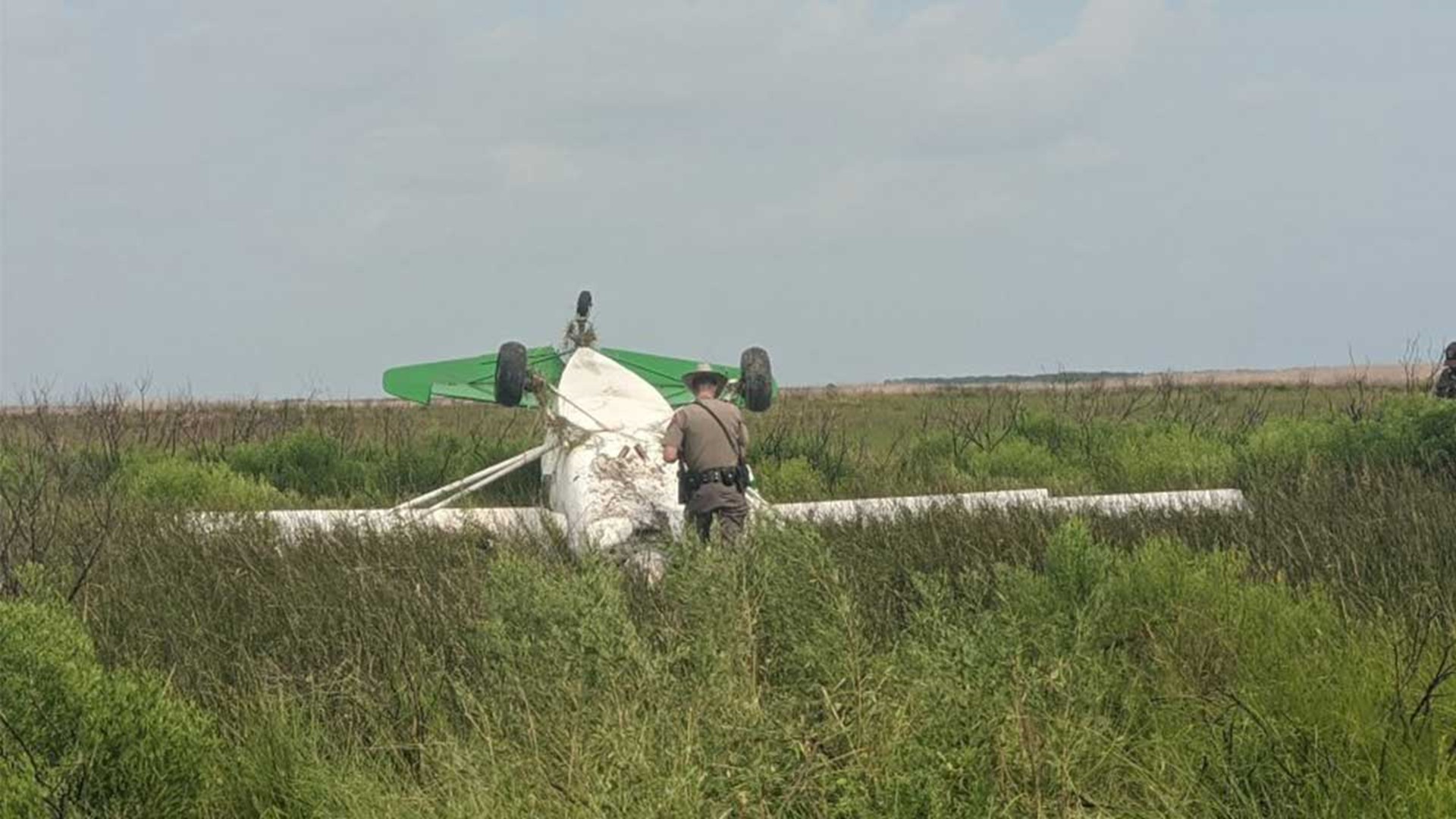 The pilot told DPS officials that he misjudged the height of the grass when he was landing.