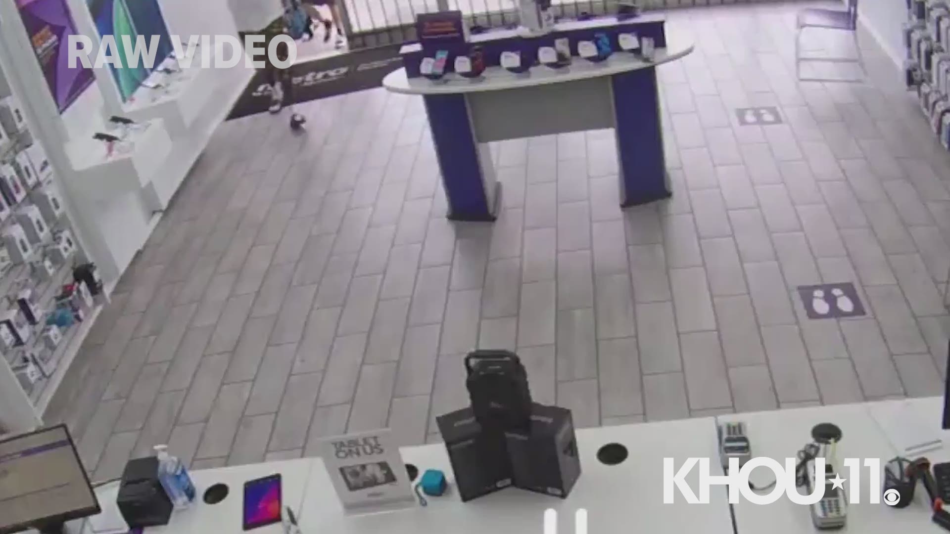 Footage from a store robbery in Houston shows a man trying to fist bump an employee after forcing the worker to hand over cash.