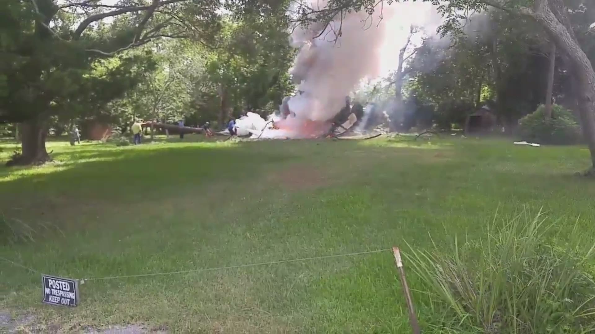 Viewer video shows the scene where a small plane crashed near the West Houston Airport on July 8. (Credit: @KyleRuehles)