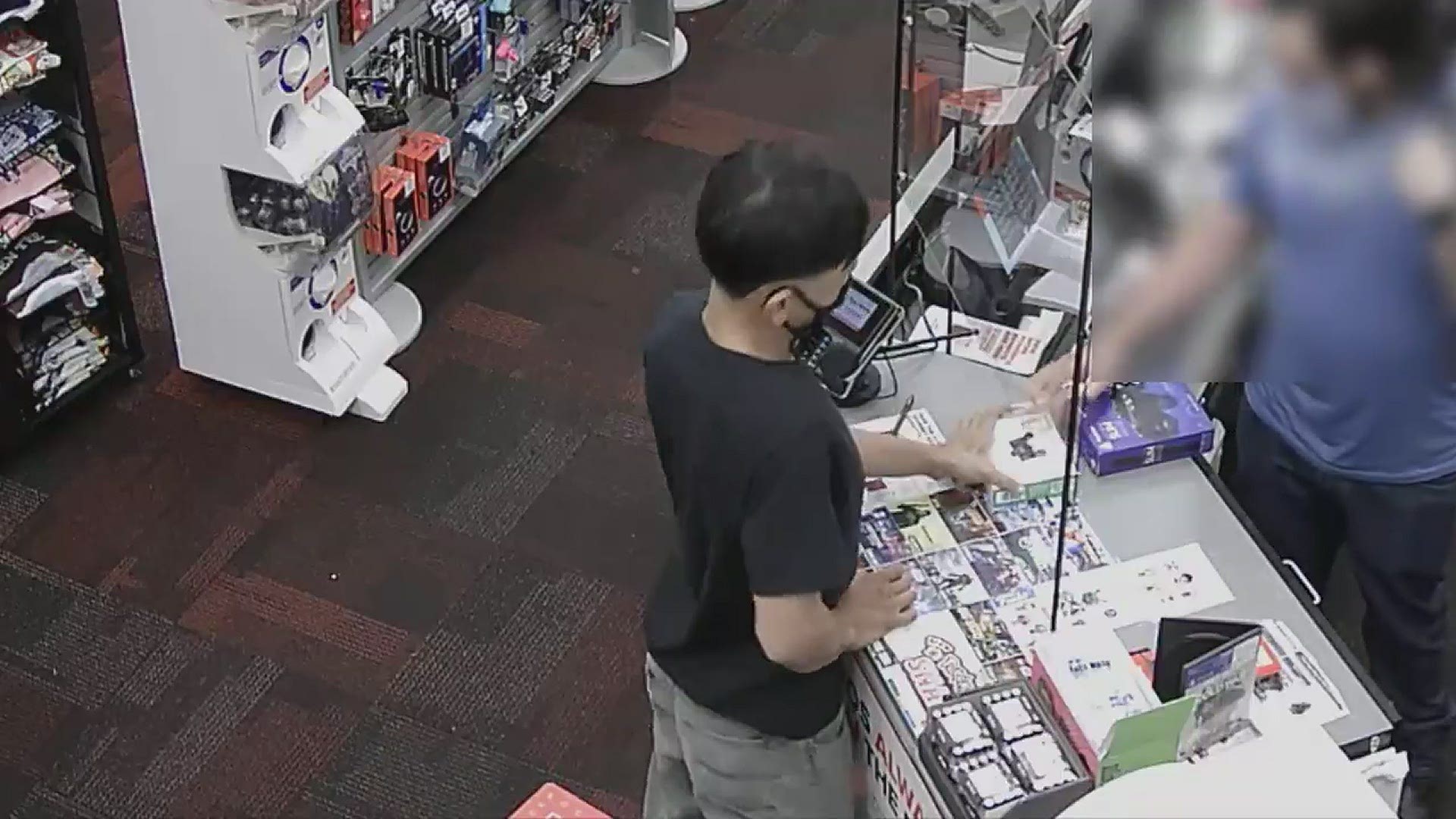 Houston police are looking for a suspect caught on camera stealing an Xbox controller from a GameStop employee in southeast Houston.
