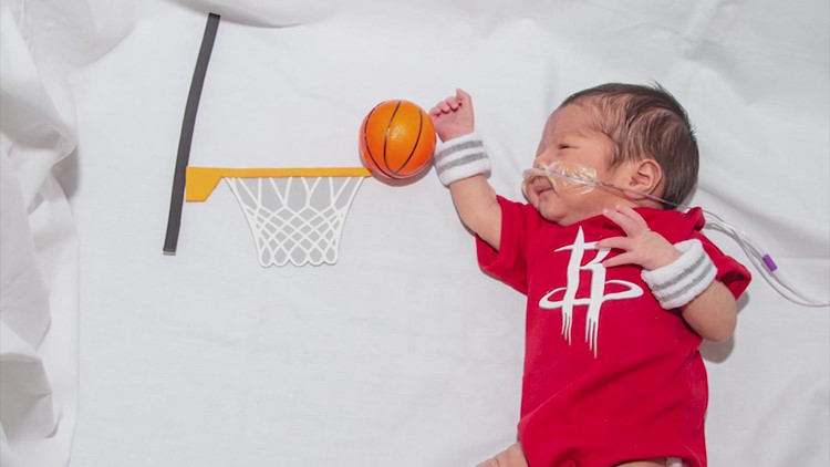 Memorial Hermann babies dressed in Rockets onesies in honor of their season opener