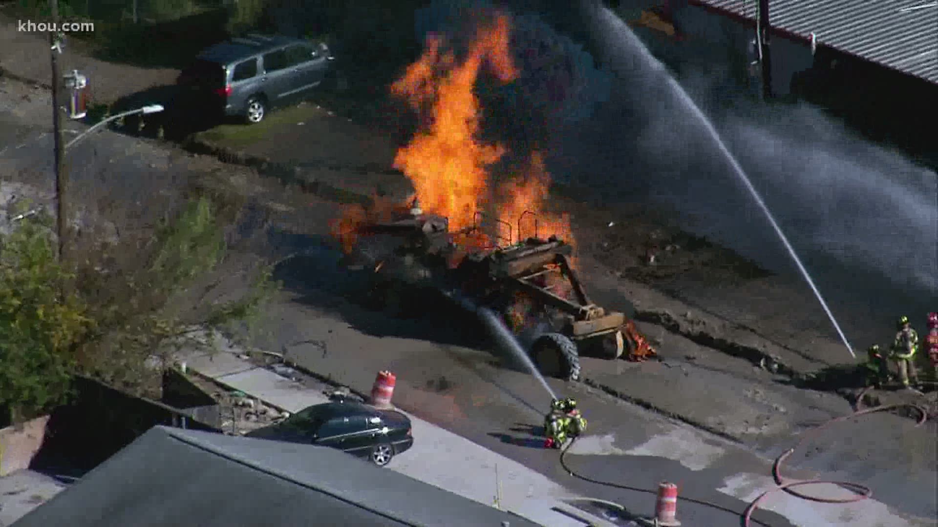 A large fire burned at a north Houston strip center Thursday. Officials said it was caused by a ruptured gas main.