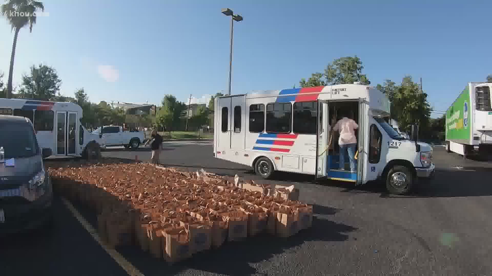 Hundreds of bags of groceries were delivered to families in need in southeast Houston Wednesday morning after their neighborhood grocery store burned down.