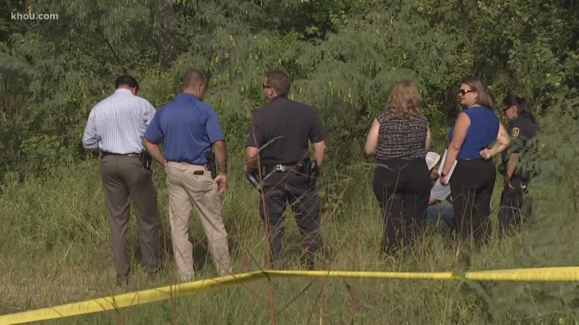 Investigators are searching a wooded area near Clear Lake City and Galveston Road Tuesday after a man discovered a grim scene overnight.