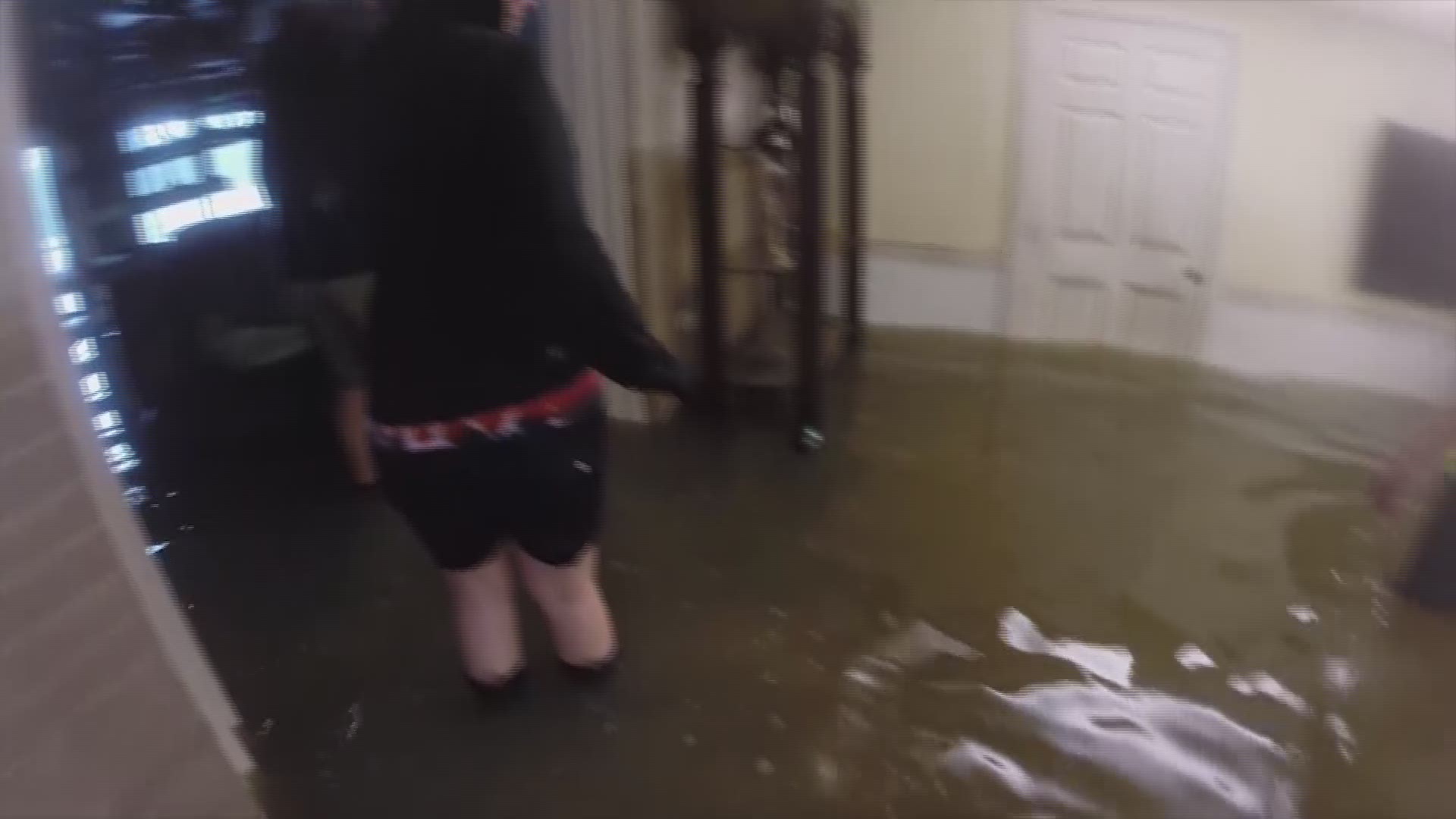 8/27/2017 ' Raw video from reporter Kevin Reece shows homeowners dealing with high water inside their Dickinson home.