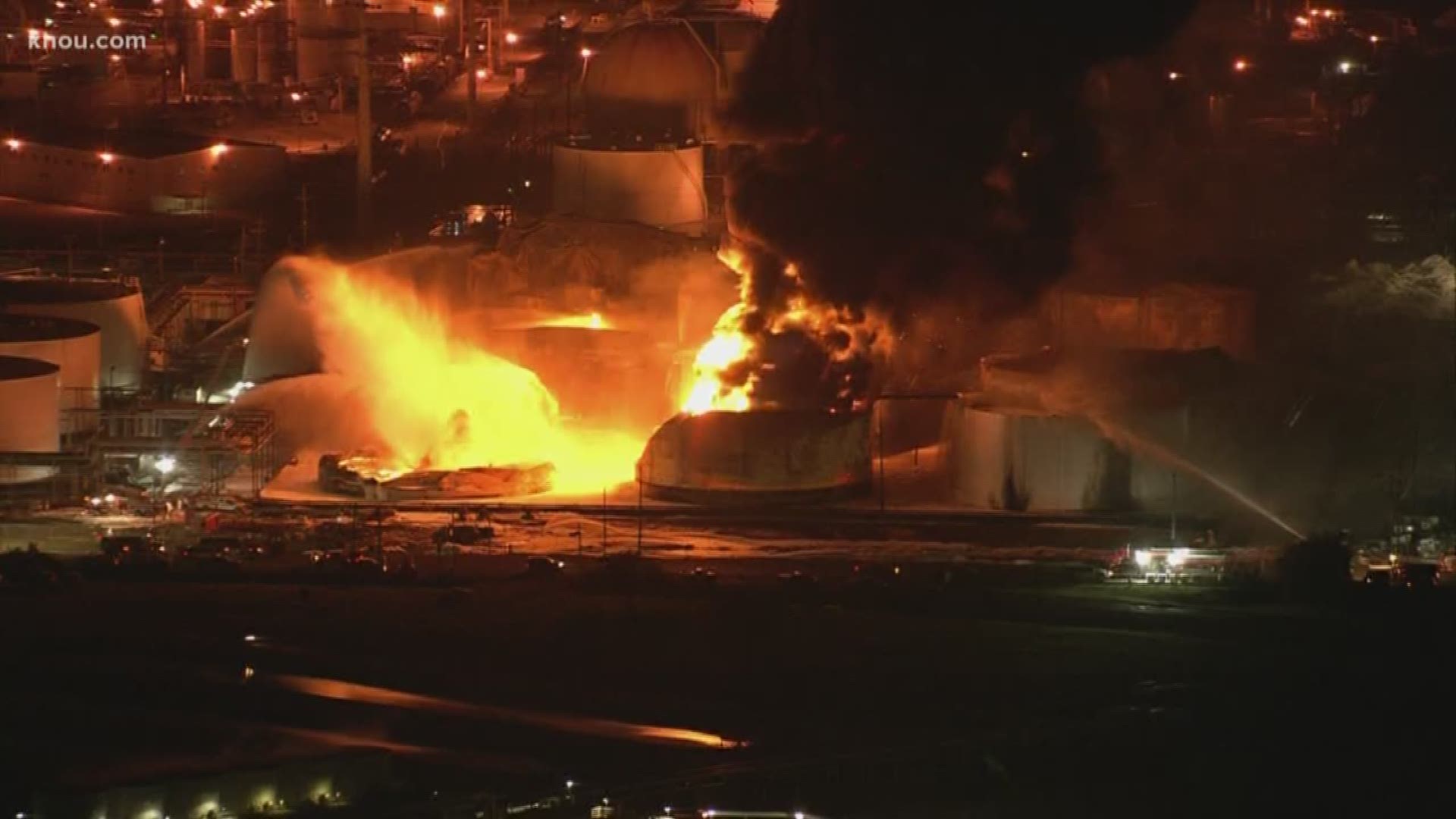 The chemical tank fire in Deer Park continued burning Tuesday night, well into its third day.