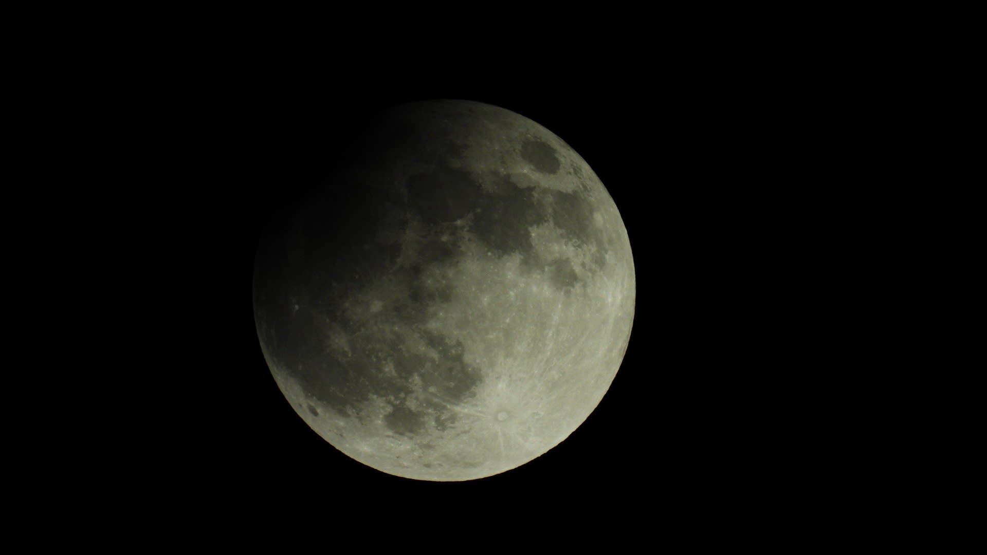 Super full harvest moon, partial lunar eclipse as seen in Houston ...