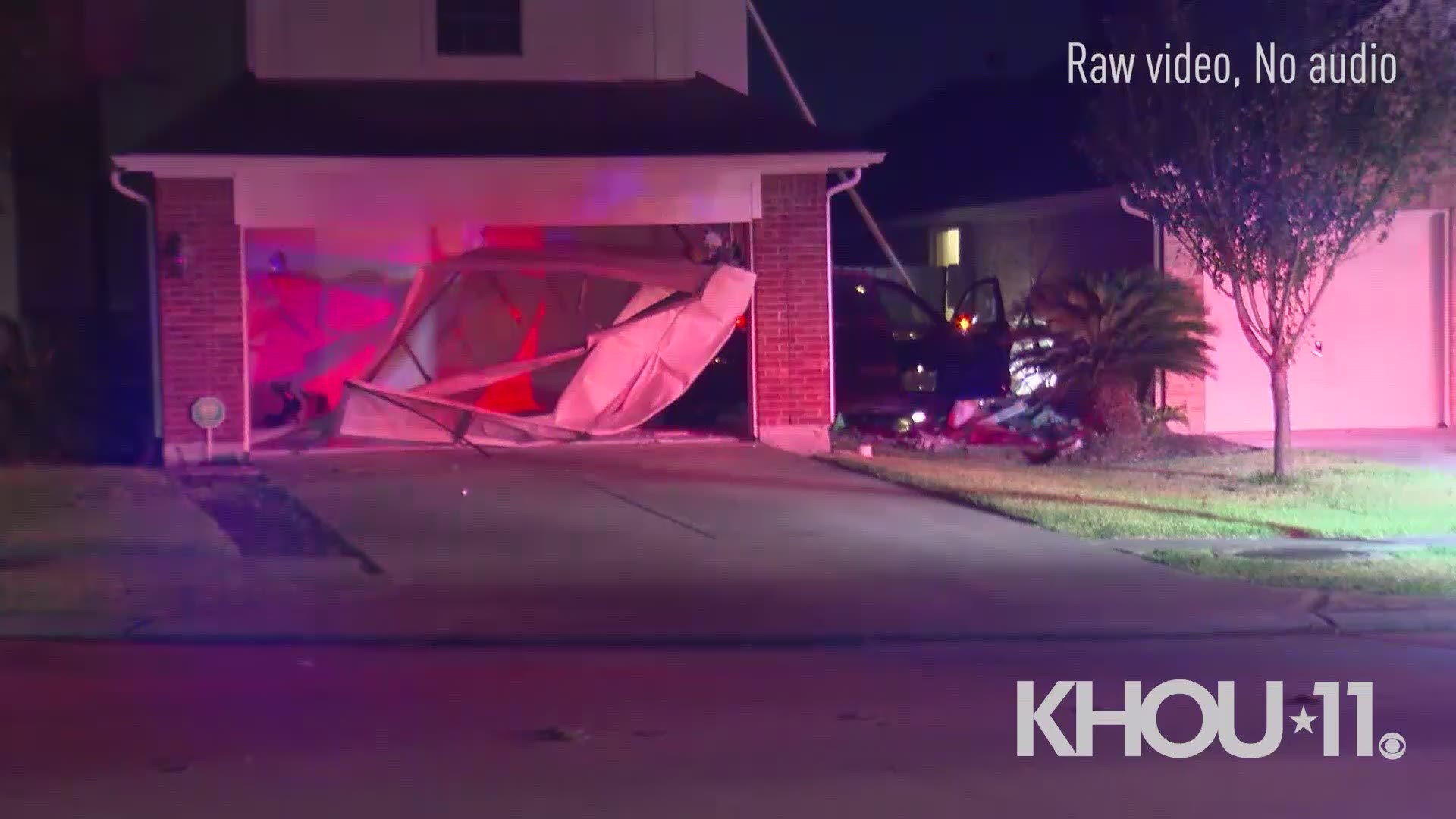 Deputies say a SUV driver crashed through a home's garage and wall, hitting a neighboring home. The crash happened in the 11100 block of Lori Brook in northwest Harris County early Tuesday.