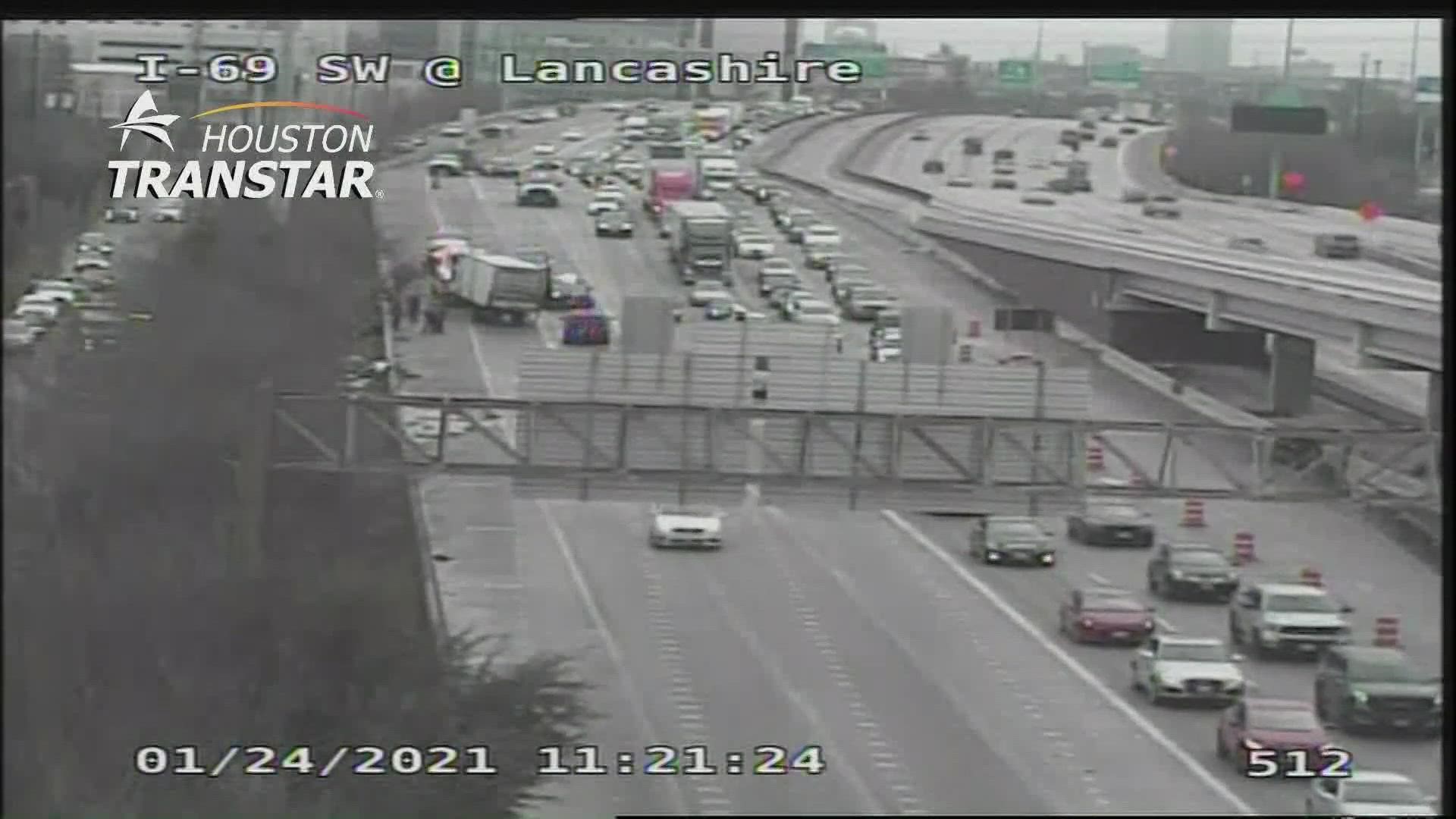 Rollover crash shuts down multiple lanes of SW Freeway near West Loop ...