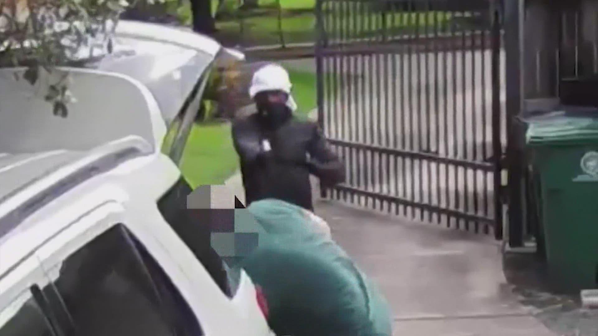 Houston police have released video showing a man getting robbed at gunpoint while loading his vehicle in southwest Houston.