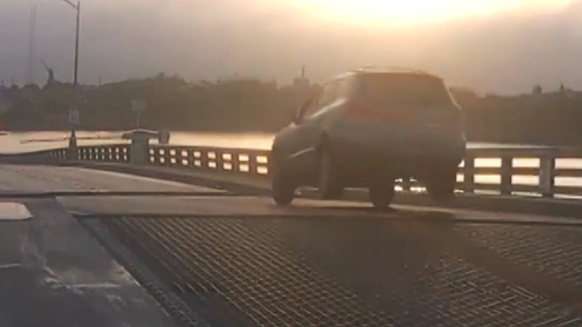 Cameras caught a driver crashing through a traffic arm and jumping a drawbridge that was going up in Daytona Beach, FL Monday (4/12).