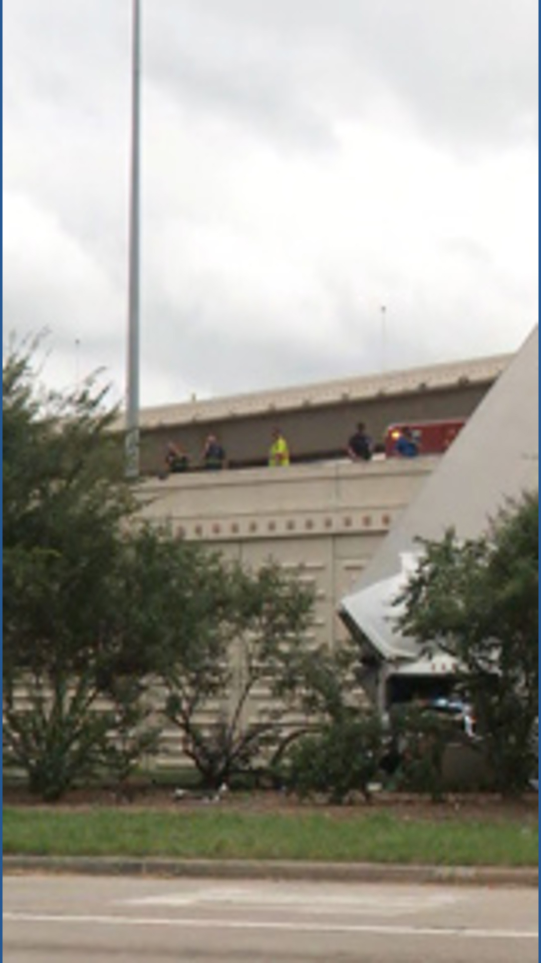 Khou Weather 18-wheeler trailer left hanging off edge of Katy Freeway after crash ...