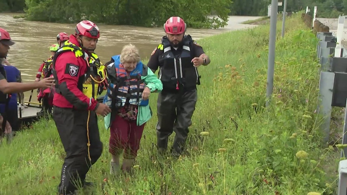 Emergency crews rescue people stranded along San Jacinto river | khou.com