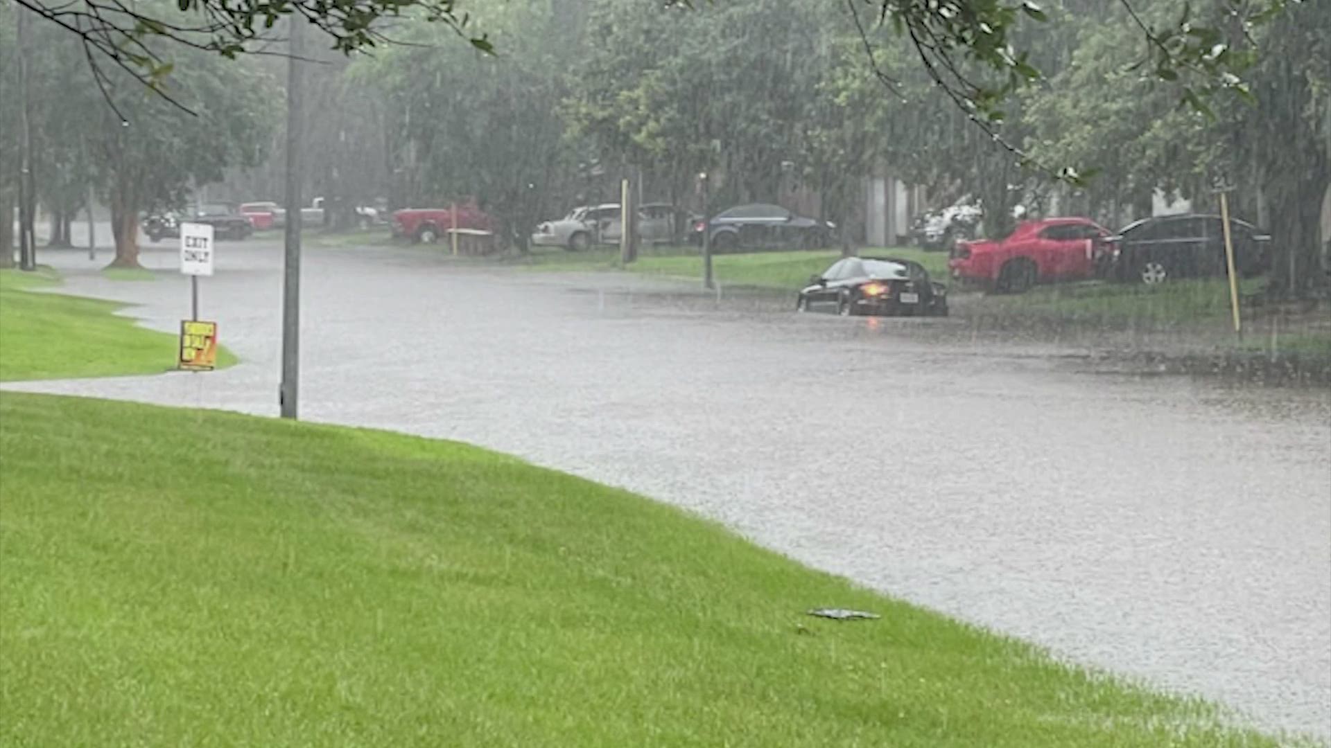 Authorities said the woman was trapped inside her vehicle in high water in the Atascocita area.