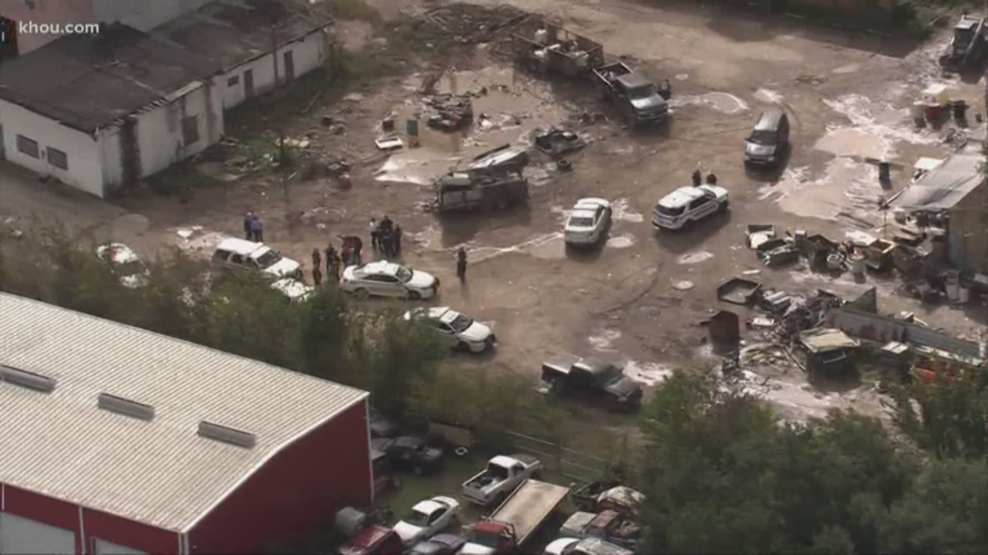 The Harris County Sheriff's Office says a man is dead and another person has been detained following a shooting at a scrap yard on the Eastex Freeway.