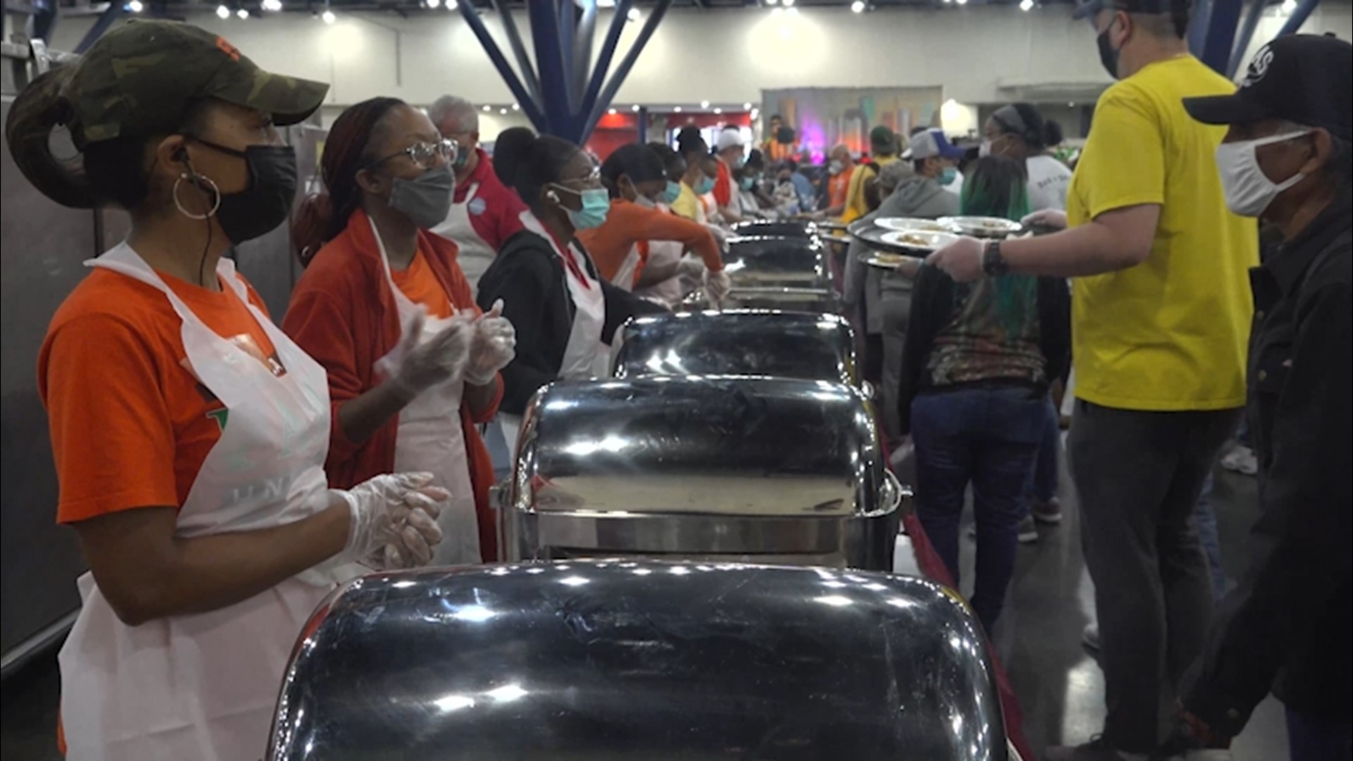 Hundreds of volunteers helped dish out warm meals on Thanksgiving.