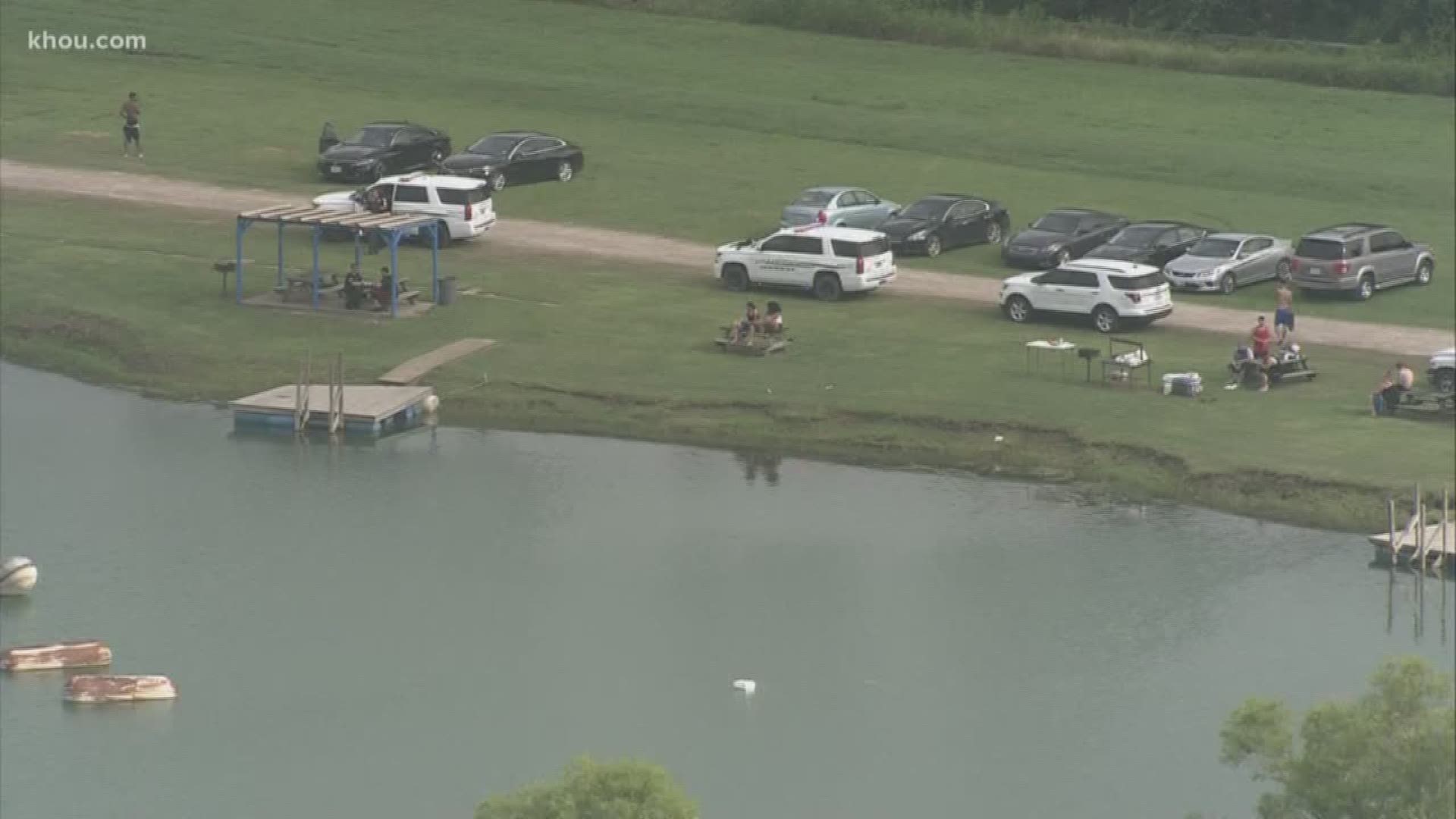 Police pulled the body of 24-year-old Timothy Beatty from a lake in Manvel after he disappeared.