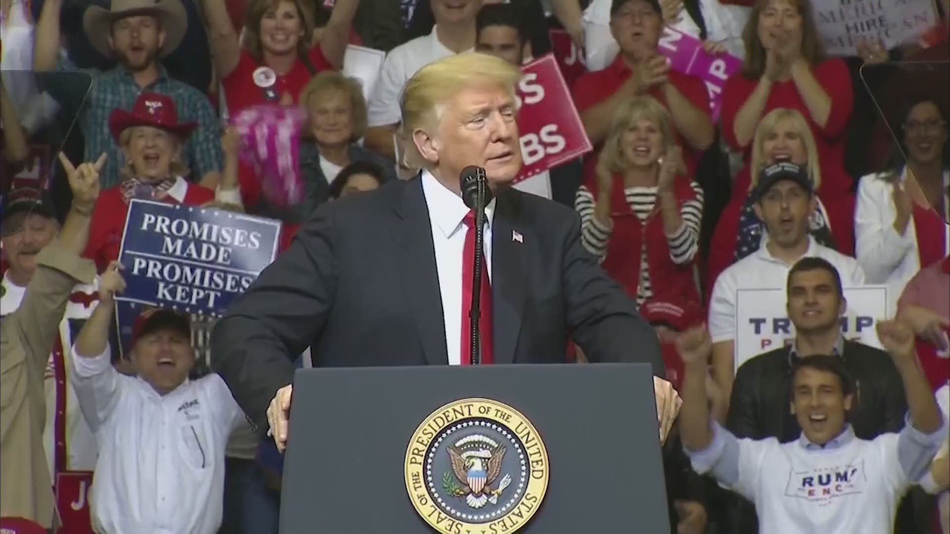 President Donald Trump speaks to supporters at Toyota Center during a MAGA rally ahead of the midterm election.