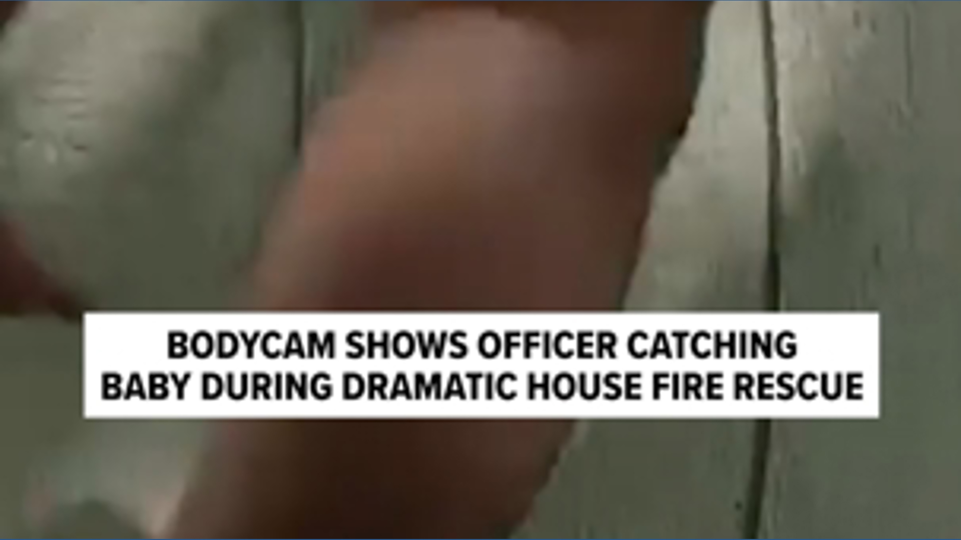 Bodycam shows officer catching baby during dramatic house fire rescue ...