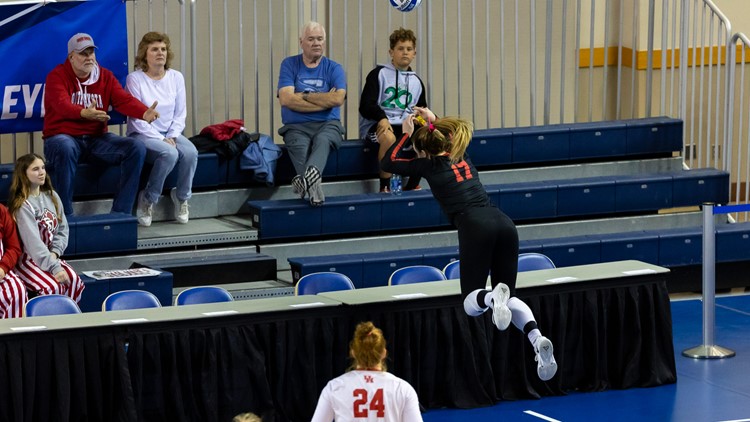 Video: UH Volleyball's Kate Georgiades dives into table to help win a point