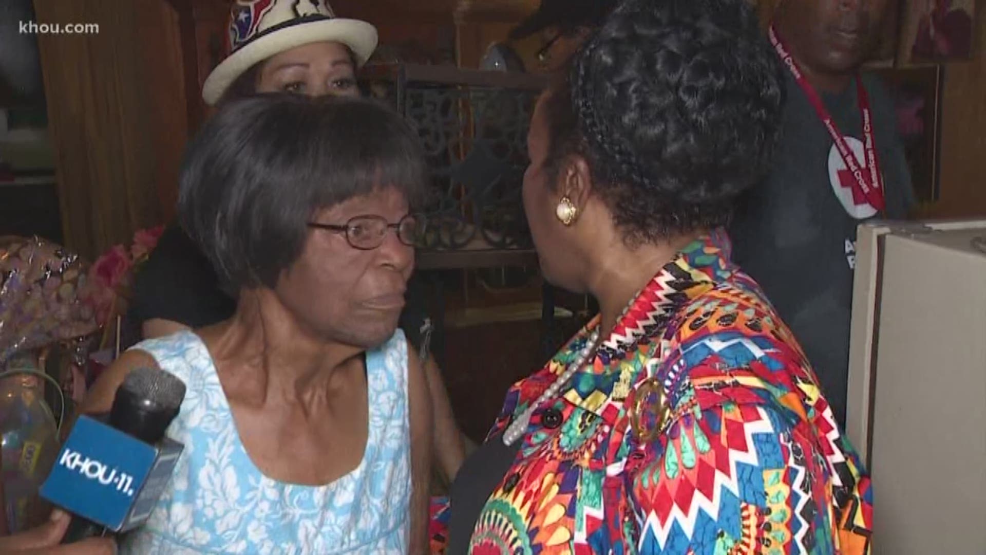As part of Congresswoman Sheila Jackson Lee's Beat The Heat Program, volunteers installed an air conditioning unit inside the home of an elderly woman.
