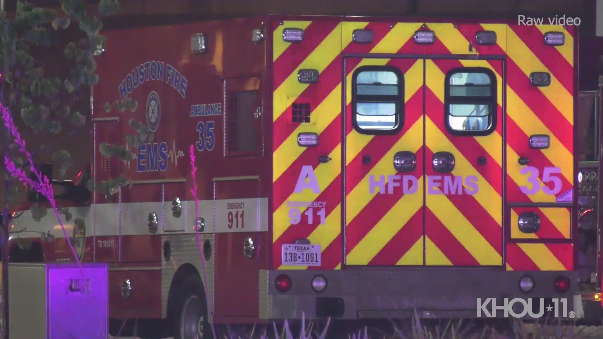 Houston police said a driver was taken into custody late Saturday night after crashing into the side of an ambulance.