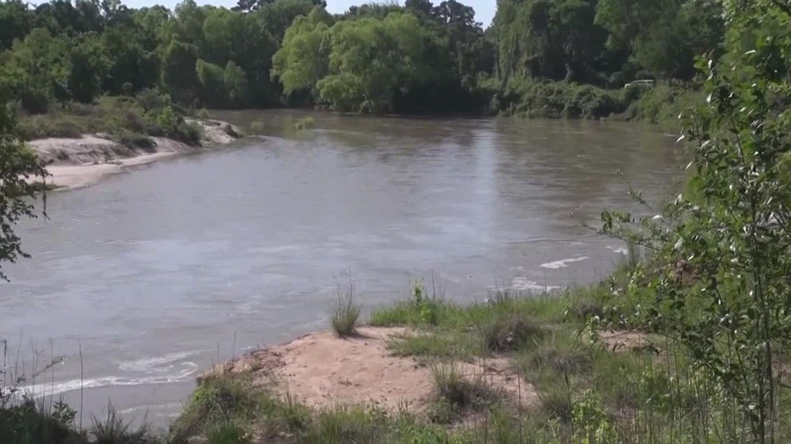 Stranded teen in San Jacinto River saved by firefighter | khou.com