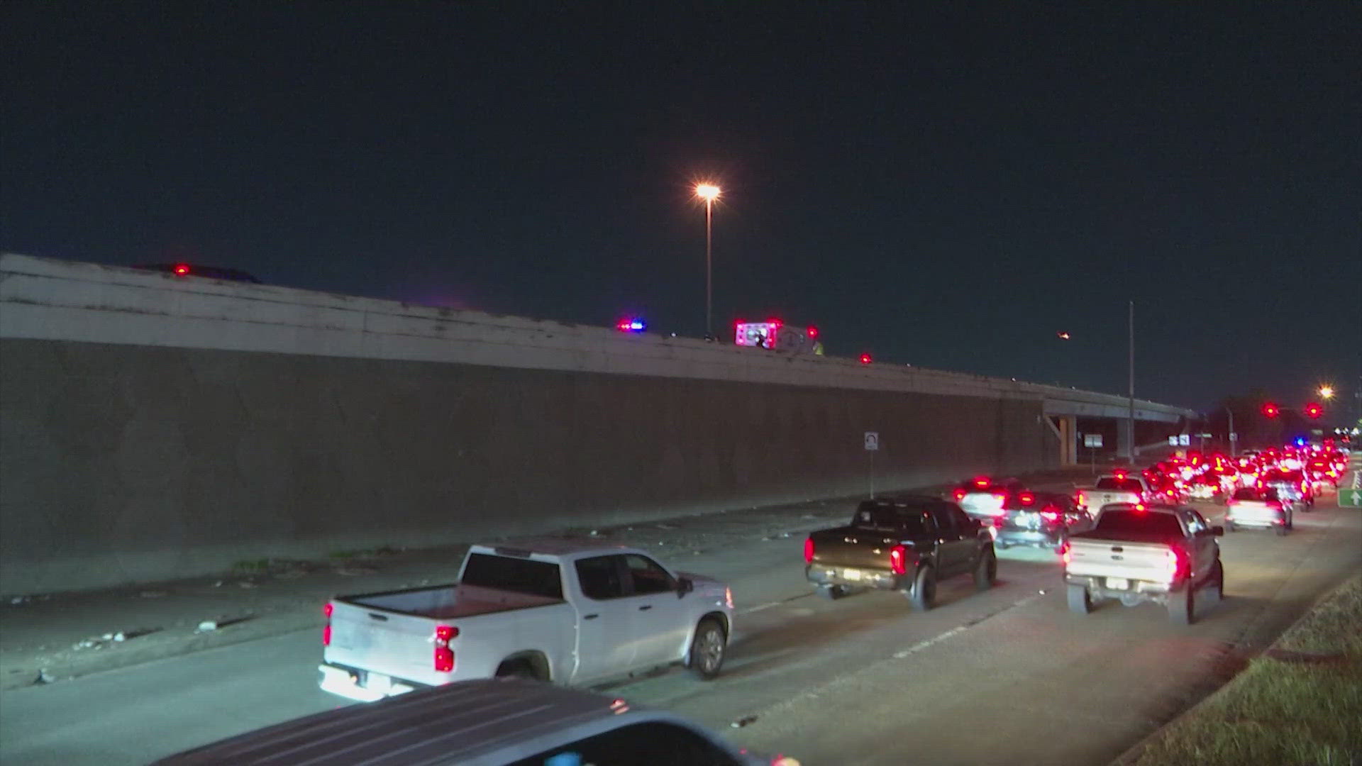 A woman thrown off an overpass after she was hit by a car on the Eastex Freeway Sunday night, according to Houston police.