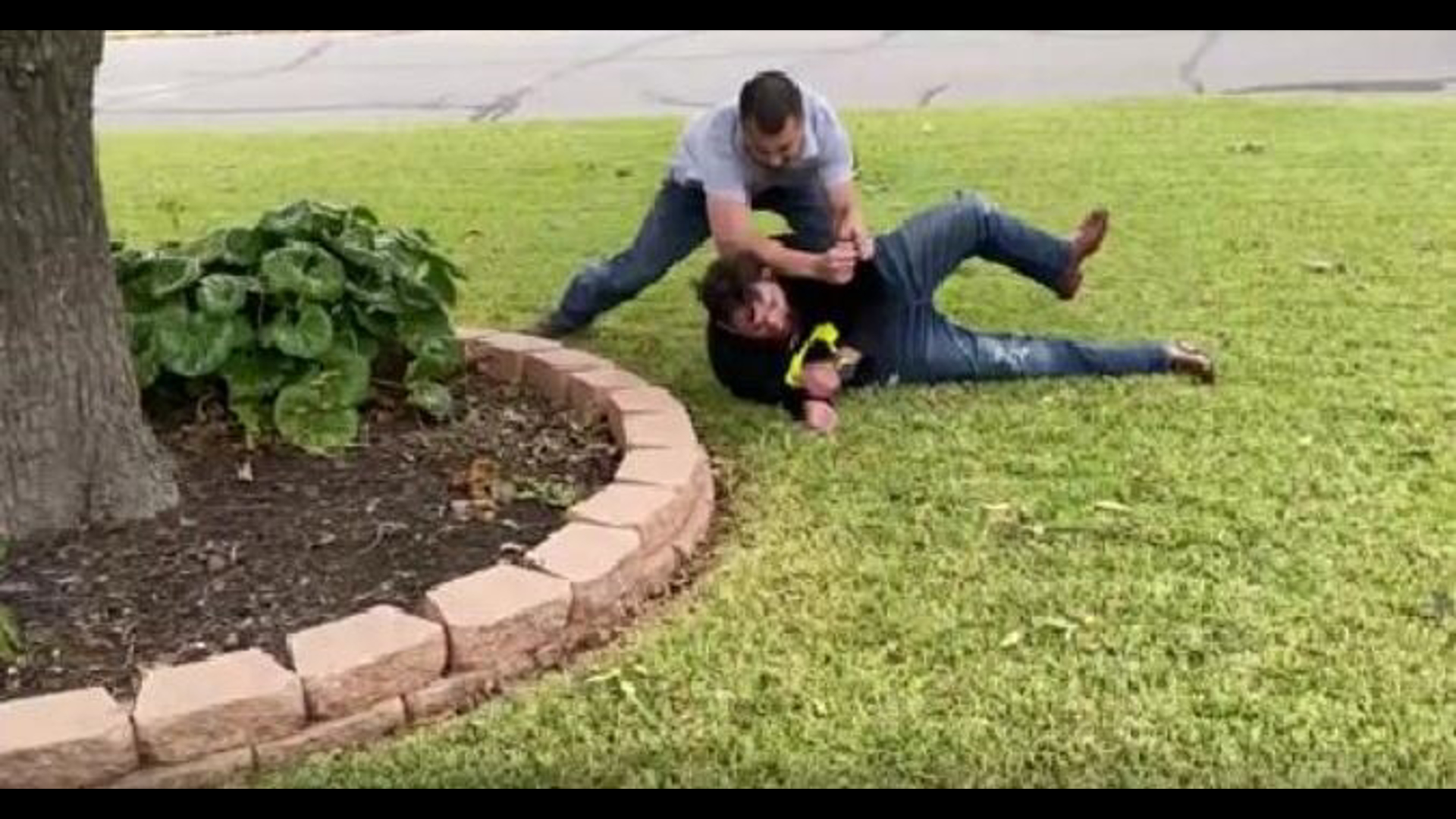 A newly released video from the Lake Worth Police Department shows Dylan Molina pinned down by a man after the crash that killed Euless Det. Alex Cervantes.