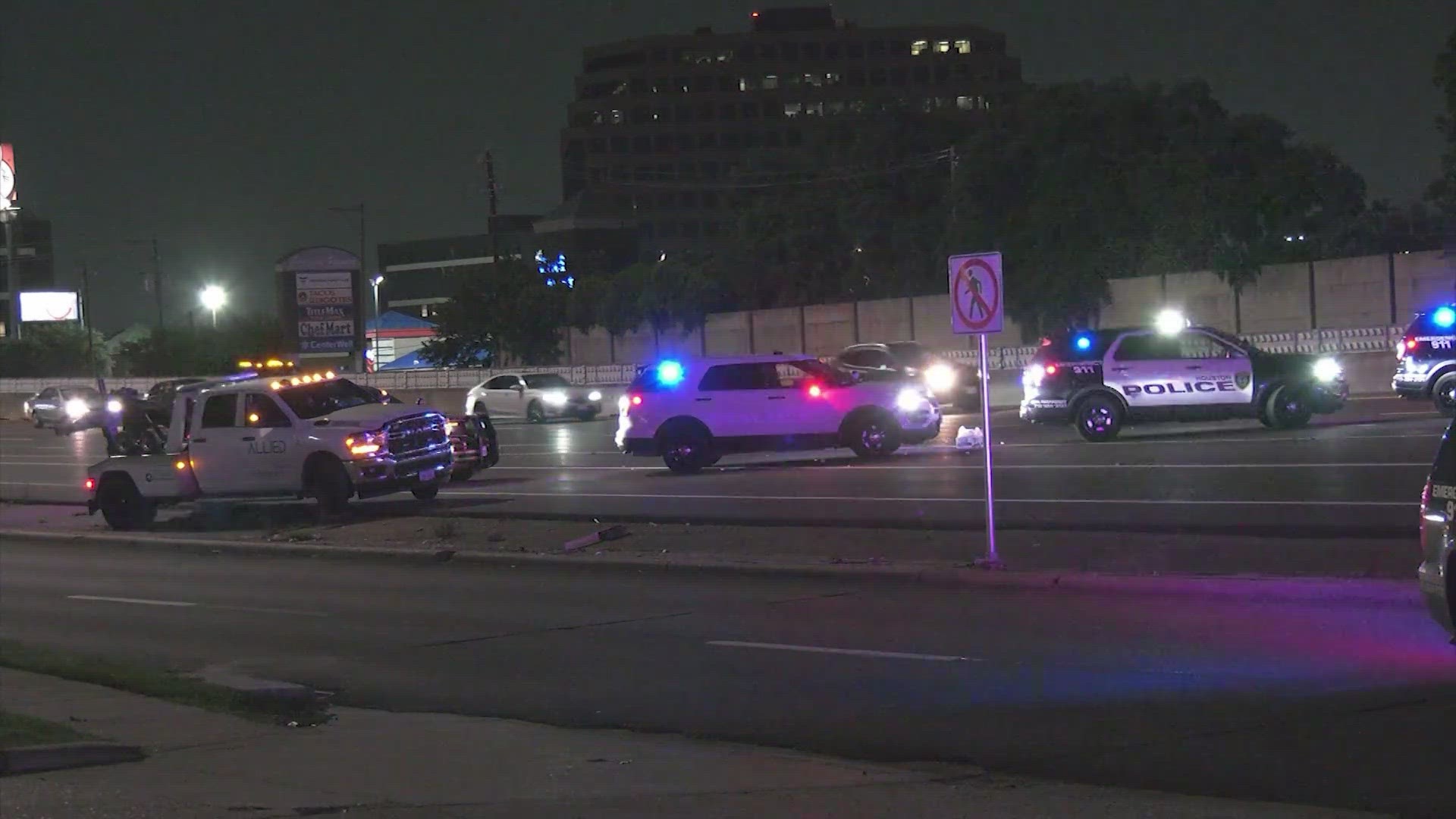 The Southwest Freeway has reopened following a single-vehicle crash that left a woman dead and sent three children to the hospital early Thursday.